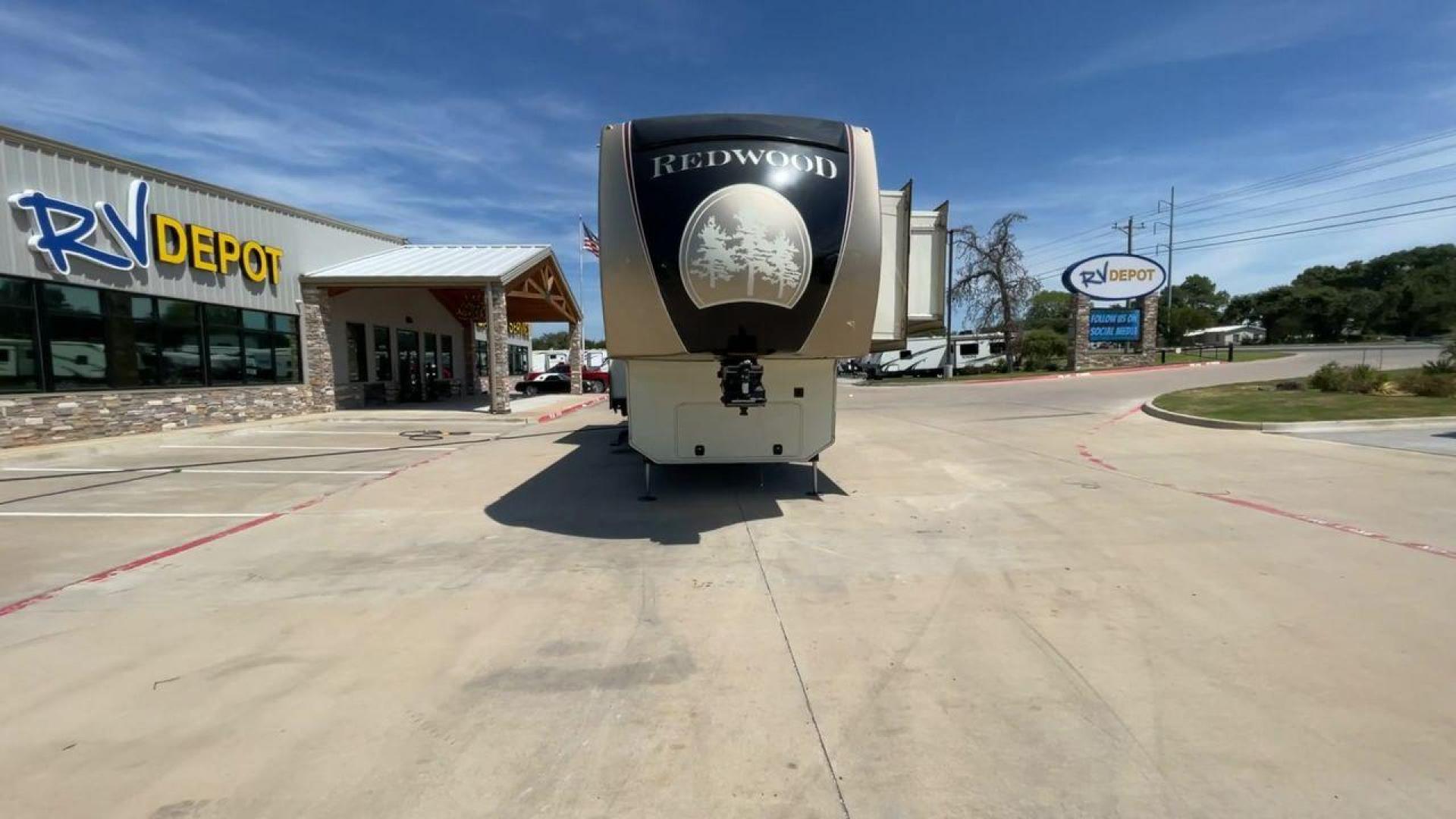 2015 REDWOOD 38RL (4V0FC3823FR) , Length: 41.42 ft. | Dry Weight: 13,672 lbs. | Gross Weight: 16,500 lbs. | Slides: 3 transmission, located at 4319 N Main Street, Cleburne, TX, 76033, (817) 221-0660, 32.435829, -97.384178 - The 2015 Redwood 38RL is a stunning fifth wheel that offers luxury, comfort, and spacious living. With an overall length of 41.42 feet and a dry weight of 13,672 lbs, this unit is built for those seeking an upscale RVing experience. The exterior features a sleek and modern design with bold maroon an - Photo#4