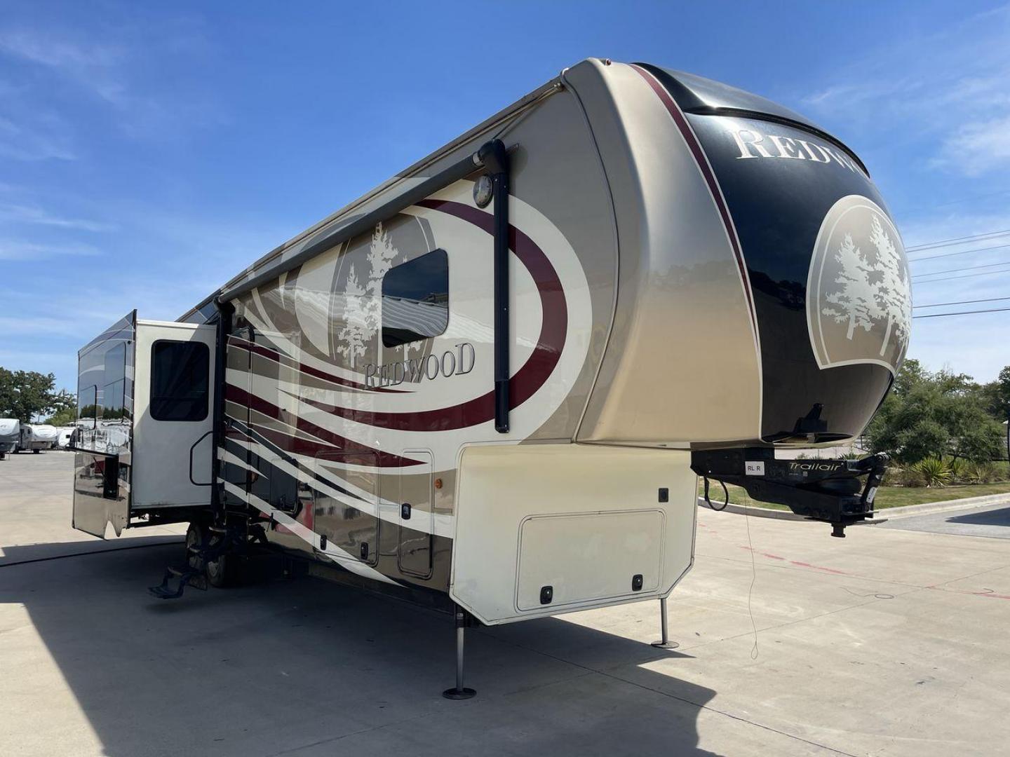 2015 REDWOOD 38RL (4V0FC3823FR) , Length: 41.42 ft. | Dry Weight: 13,672 lbs. | Gross Weight: 16,500 lbs. | Slides: 3 transmission, located at 4319 N Main Street, Cleburne, TX, 76033, (817) 221-0660, 32.435829, -97.384178 - The 2015 Redwood 38RL is a stunning fifth wheel that offers luxury, comfort, and spacious living. With an overall length of 41.42 feet and a dry weight of 13,672 lbs, this unit is built for those seeking an upscale RVing experience. The exterior features a sleek and modern design with bold maroon an - Photo#22