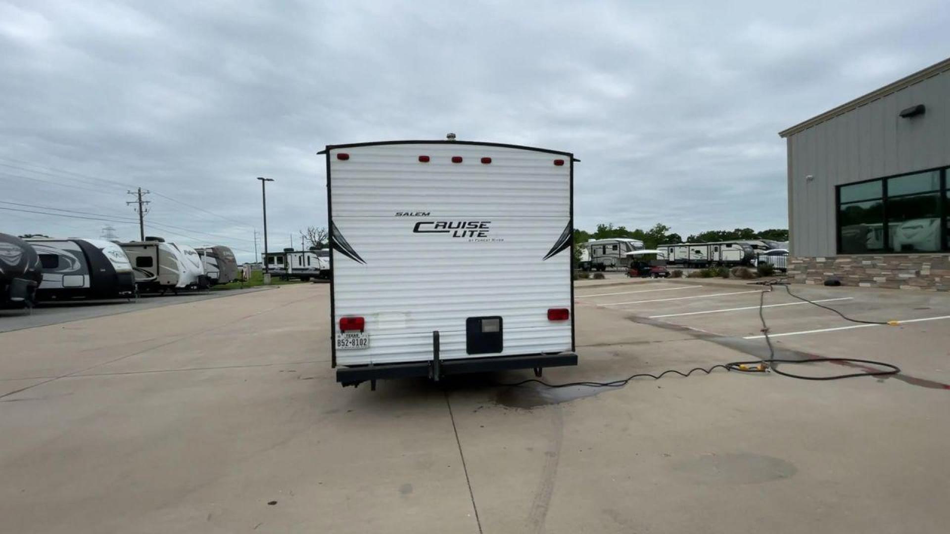 2015 WHITE SALEM CRUISE LITE 261BHXL (4X4TSMB20F7) , Length: 29.08 ft. | Dry Weight: 4,313 lbs. transmission, located at 4319 N Main Street, Cleburne, TX, 76033, (817) 221-0660, 32.435829, -97.384178 - This 2015 Forest River Salem Cruise Lite 261BHXL travel trailer measures 29'1" feet. It is a dual axle, chrome wheel setup with electric drum brakes. Its dry weight is 4,313 lbs, its payload capacity 3,082 lbs, and its hitch weight 434 lbs. The aluminum exterior is painted white with gray graphics. - Photo#8