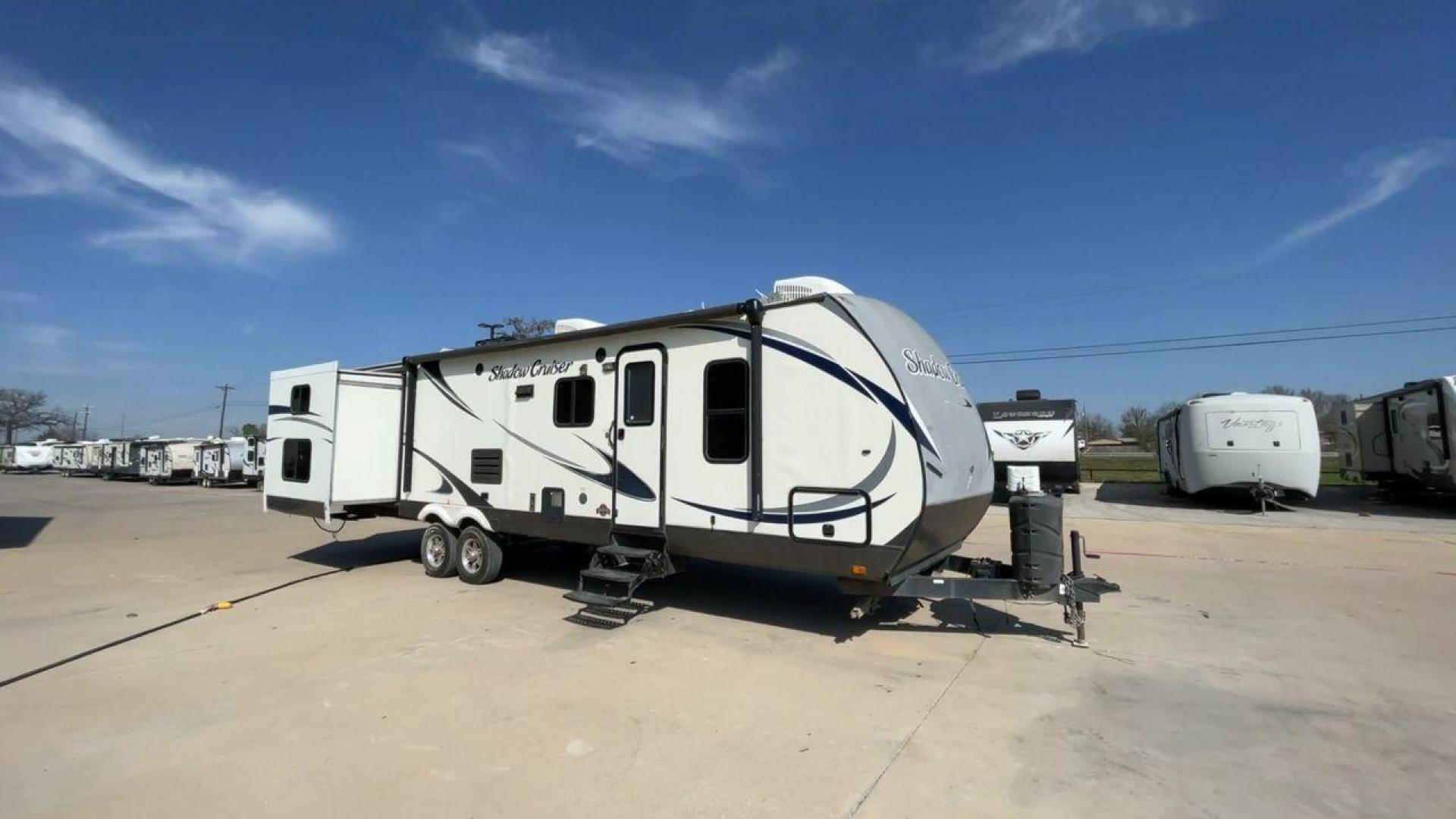 2015 WHITE SHADOW CRUISER 314TSB (5RXTD312XF1) , Length: 35 ft | Dry Weight: 6,290 lbs | Slides: 3 transmission, located at 4319 N Main Street, Cleburne, TX, 76033, (817) 221-0660, 32.435829, -97.384178 - The 2015 Cruiser RV Shadow Cruiser 314TSB Travel Trailer invites you to experience the perfect fusion of luxury and exploration. Designed for remarkable adventures, this 35-foot travel trailer features a carefully planned layout that maximizes space and usability. Perfect for short trips or long adv - Photo#3