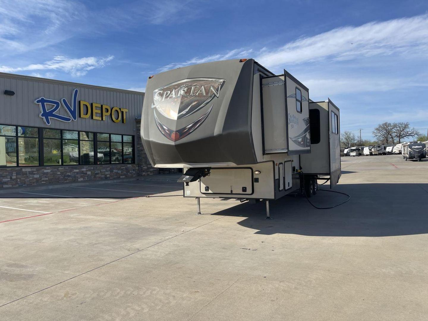 2015 WHITE SPARTAN 3210 (5ZT3STXBXFG) , located at 4319 N Main Street, Cleburne, TX, 76033, (817) 221-0660, 32.435829, -97.384178 - Here are additional factors highlighting why owning this RV is a superb choice. (1) The 2015 Spartan 3210 Toy Hauler has Aluminum-framed construction with vacuum-bonded laminated sidewalls (2) It features Electric patio awning, Pass-through storage compartments and Spare tire with lockable compa - Photo#0