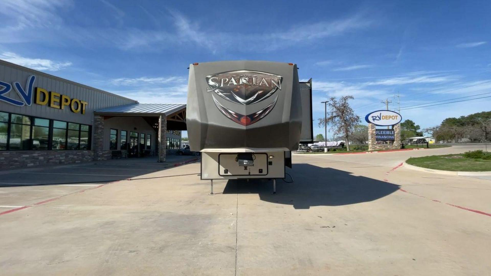 2015 WHITE SPARTAN 3210 (5ZT3STXBXFG) , located at 4319 N Main Street, Cleburne, TX, 76033, (817) 221-0660, 32.435829, -97.384178 - Here are additional factors highlighting why owning this RV is a superb choice. (1) The 2015 Spartan 3210 Toy Hauler has Aluminum-framed construction with vacuum-bonded laminated sidewalls (2) It features Electric patio awning, Pass-through storage compartments and Spare tire with lockable compa - Photo#4