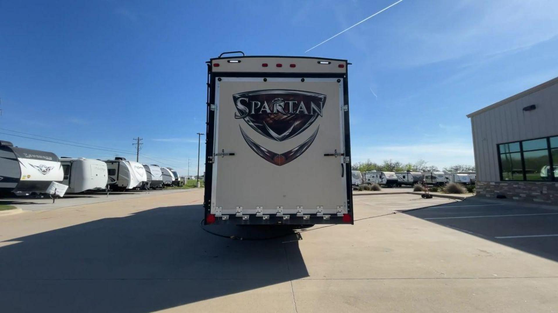 2015 WHITE SPARTAN 3210 (5ZT3STXBXFG) , located at 4319 N Main Street, Cleburne, TX, 76033, (817) 221-0660, 32.435829, -97.384178 - Here are additional factors highlighting why owning this RV is a superb choice. (1) The 2015 Spartan 3210 Toy Hauler has Aluminum-framed construction with vacuum-bonded laminated sidewalls (2) It features Electric patio awning, Pass-through storage compartments and Spare tire with lockable compa - Photo#8