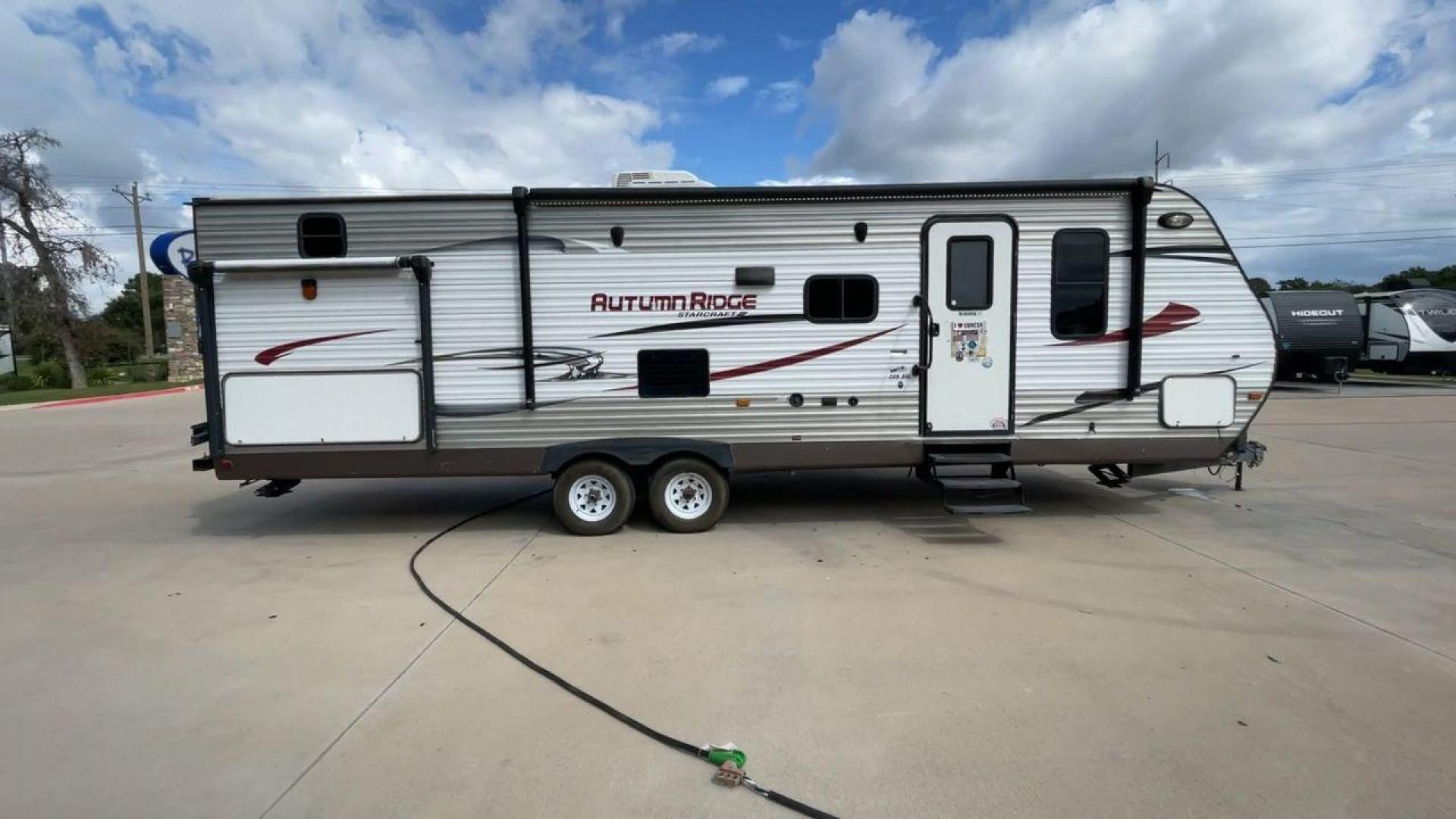 2015 STARCRAFT HOMESTEAD 309BHL (1SABS0BR1F2) , Length: 33.92 ft | Dry Weight: 6,720 lbs. lbs | Gross Weight: 9,250 lbs. | Slides: 1 transmission, located at 4319 N Main Street, Cleburne, TX, 76033, (817) 221-0660, 32.435829, -97.384178 - The 2015 Starcraft Homestead 309QK is more than just a trailer – it's your home away from home. This expansive and cozy travel trailer is tailor-made for families or groups of up to 8 people. Boasting a master bedroom with a queen-size bed, bunk beds in the rear bedroom, and a dinette conversion b - Photo#2