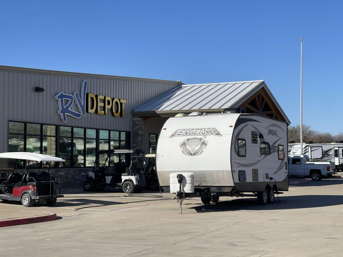 2015 WHITE VENGEANCE 19V (4X4TVGU27FY) , Length: 25 ft. | Dry Weight: 5,166 lbs. | Gross Weight: 7,945 lbs. transmission, located at 4319 N Main Street, Cleburne, TX, 76033, (817) 221-0660, 32.435829, -97.384178 - The 2015 Forest River Vengeance 19V is a compact and inviting travel trailer that brings simplicity and comfort to your adventures. With a length of ~25 feet and a width of 8 feet, this trailer has a manageable size, making it easy to tow with a compatible vehicle. The sleeping capacity generously a - Photo#0