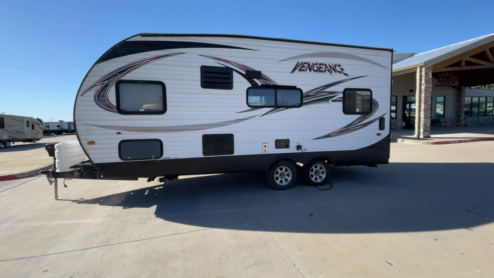 2015 WHITE VENGEANCE 19V (4X4TVGU27FY) , Length: 25 ft. | Dry Weight: 5,166 lbs. | Gross Weight: 7,945 lbs. transmission, located at 4319 N Main Street, Cleburne, TX, 76033, (817) 221-0660, 32.435829, -97.384178 - The 2015 Forest River Vengeance 19V is a compact and inviting travel trailer that brings simplicity and comfort to your adventures. With a length of ~25 feet and a width of 8 feet, this trailer has a manageable size, making it easy to tow with a compatible vehicle. The sleeping capacity generously a - Photo#6