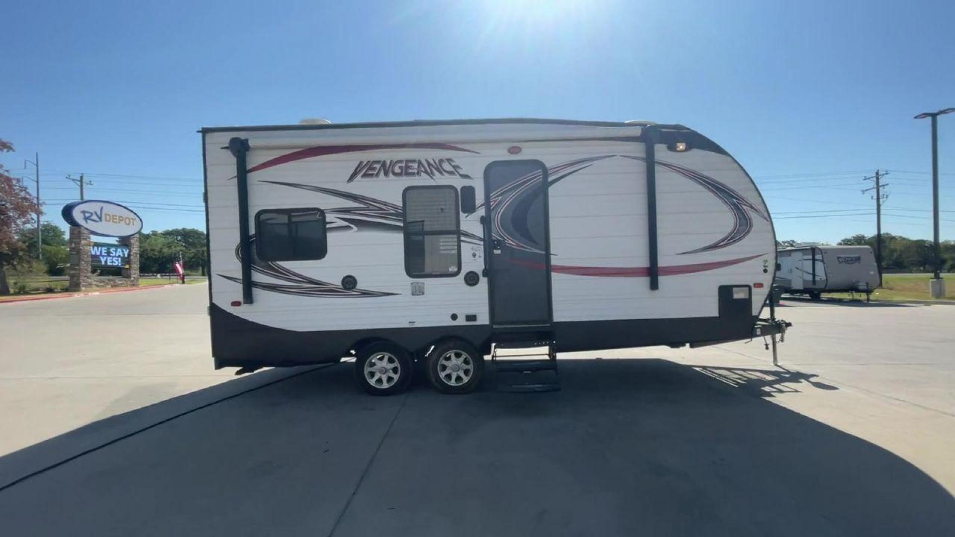 2015 WHITE VENGEANCE 19V (4X4TVGU27FY) , Length: 25 ft. | Dry Weight: 5,166 lbs. | Gross Weight: 7,945 lbs. transmission, located at 4319 N Main Street, Cleburne, TX, 76033, (817) 221-0660, 32.435829, -97.384178 - The 2015 Forest River Vengeance 19V is a compact and inviting travel trailer that brings simplicity and comfort to your adventures. With a length of ~25 feet and a width of 8 feet, this trailer has a manageable size, making it easy to tow with a compatible vehicle. The sleeping capacity generously a - Photo#2