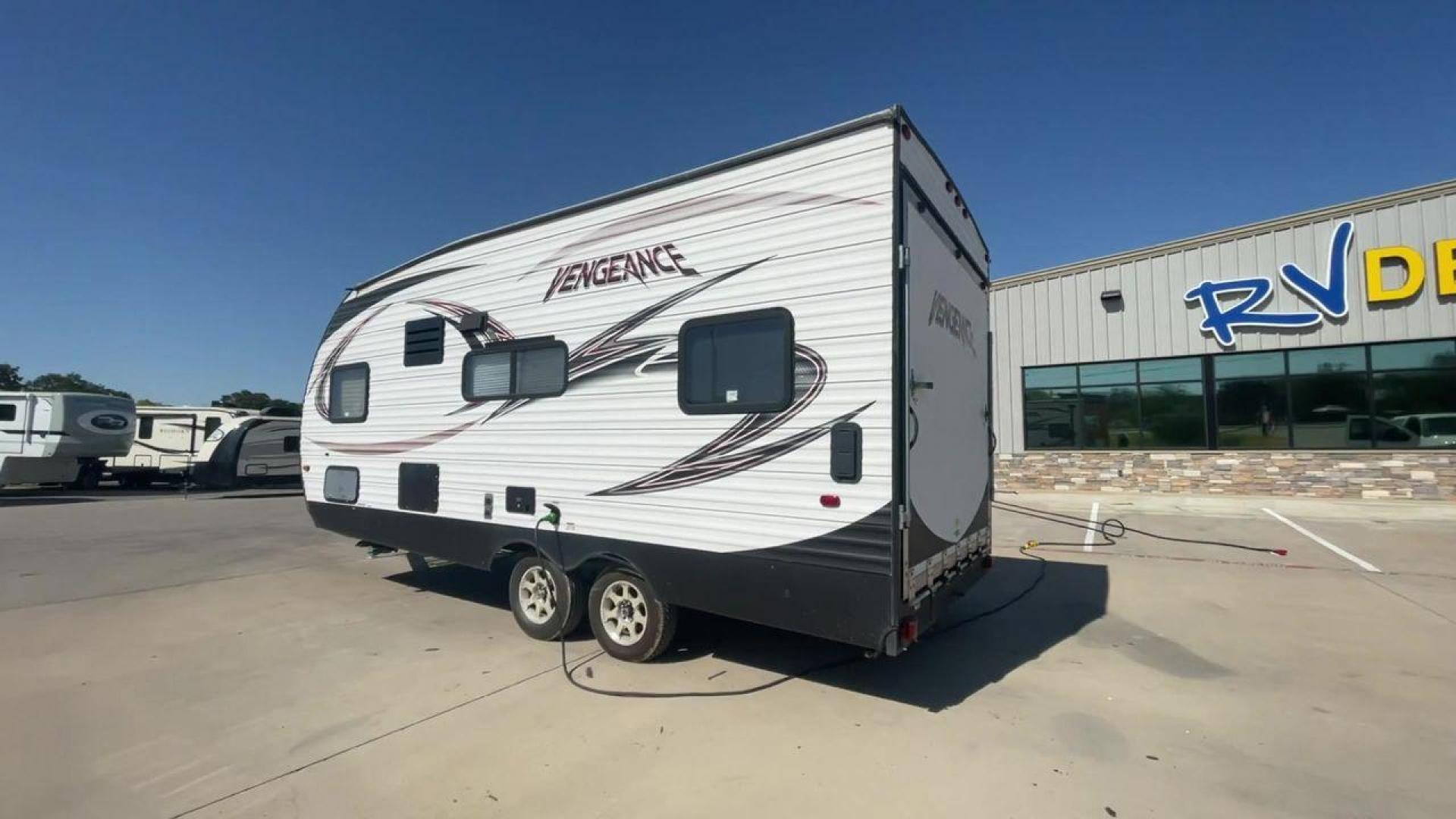 2015 WHITE VENGEANCE 19V (4X4TVGU27FY) , Length: 25 ft. | Dry Weight: 5,166 lbs. | Gross Weight: 7,945 lbs. transmission, located at 4319 N Main Street, Cleburne, TX, 76033, (817) 221-0660, 32.435829, -97.384178 - The 2015 Forest River Vengeance 19V is a compact and inviting travel trailer that brings simplicity and comfort to your adventures. With a length of ~25 feet and a width of 8 feet, this trailer has a manageable size, making it easy to tow with a compatible vehicle. The sleeping capacity generously a - Photo#7