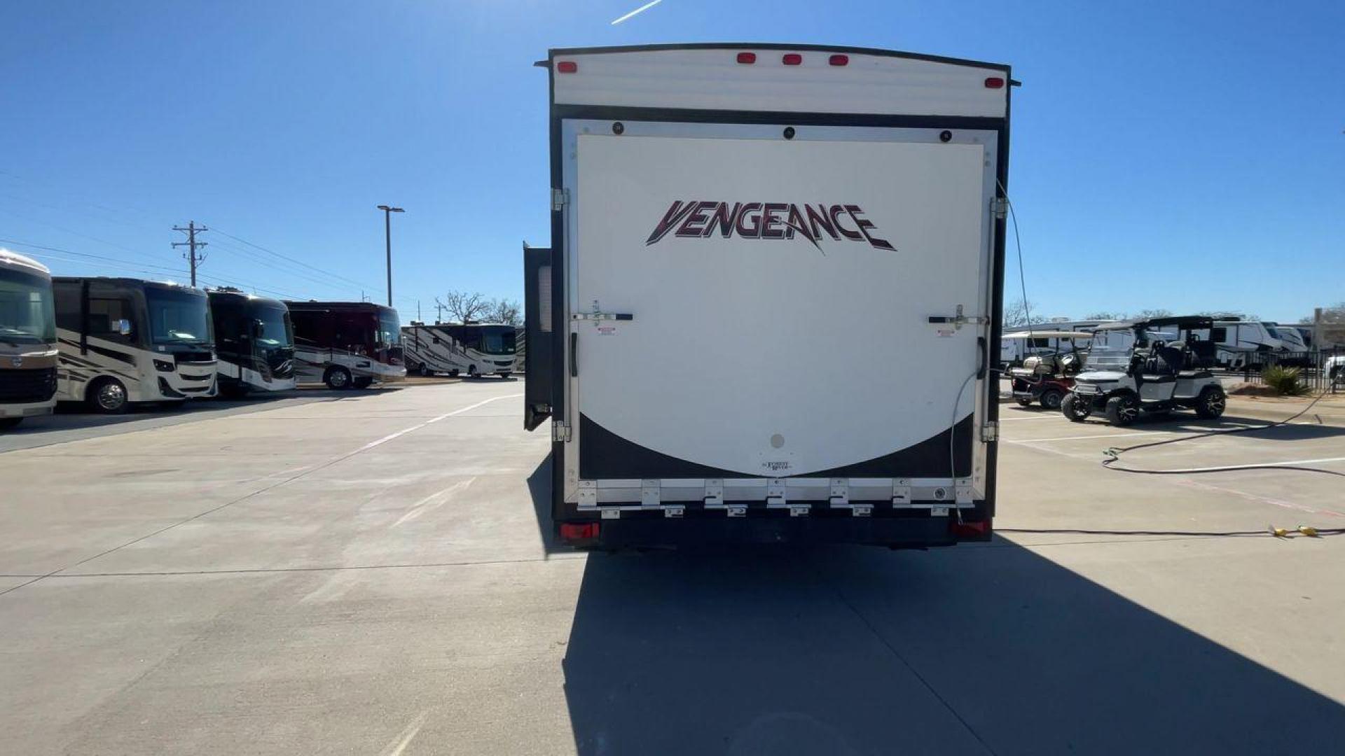 2015 WHITE VENGEANCE SU 29V (4X4TVGE24FY) , Length: 34.5 ft. | Dry Weight: 7,618 lbs. | Gross Weight: 9,985 lbs. | Slides: 1 transmission, located at 4319 N Main Street, Cleburne, TX, 76033, (817) 221-0660, 32.435829, -97.384178 - The 2015 Vengeance SU 29V is a versatile and spacious toy hauler, ideal for outdoor enthusiasts who crave adventure. With a length of 34.5 feet and a dry weight of 7,618 pounds, this travel trailer provides generous storage space while ensuring your comfort is not compromised. With a single slide, t - Photo#8