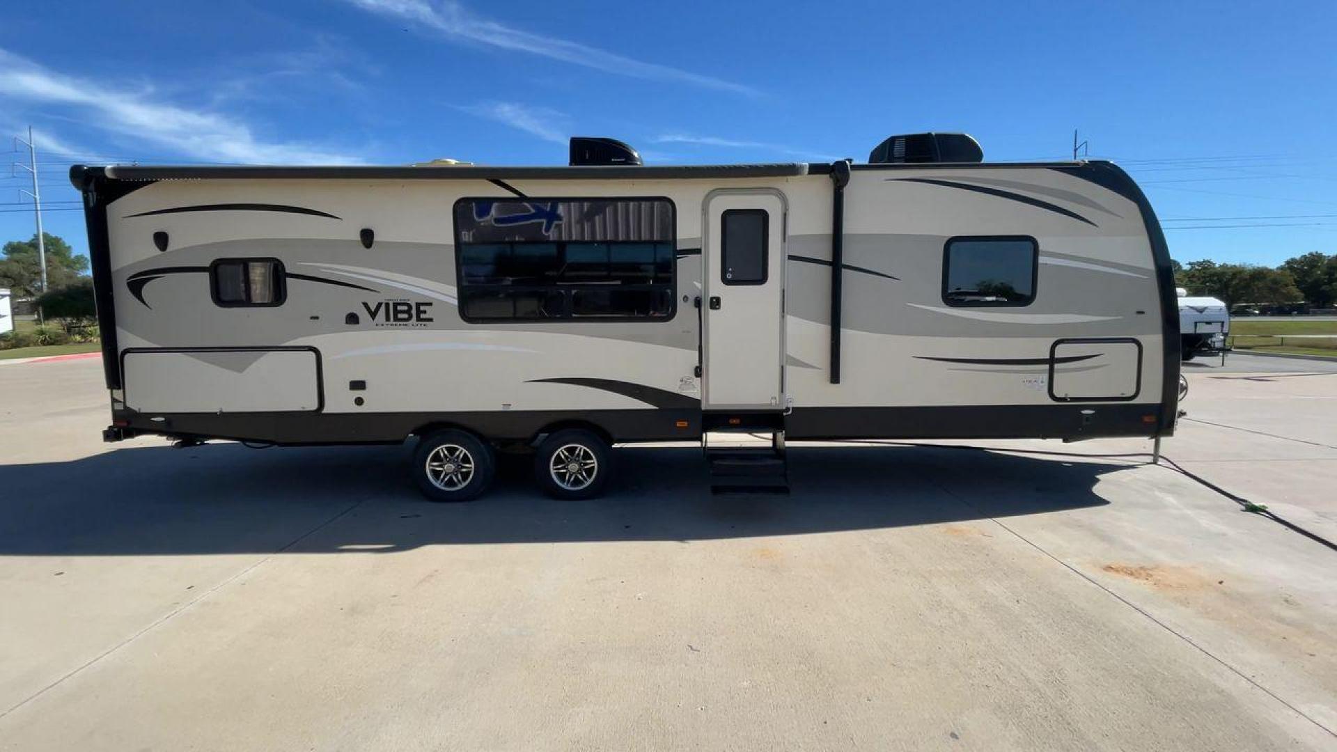 2015 TAN VIBE EXTREME 268RKS (4X4TVBC29F4) , Length: 32 ft. | Dry Weight: 6,398 lbs. | Slides: 1 transmission, located at 4319 N Main Street, Cleburne, TX, 76033, (817) 221-0660, 32.435829, -97.384178 - The 2015 Vibe Extreme 268RKS travel trailer will significantly serve you with its amenities and features. This trailer only measures 32 ft in length, 8 ft in width, and 11 ft in height. It has a dry weight of 6,398 lbs with a payload capacity of 1,867 lbs and a hitch weight of 742 lbs. A small k - Photo#2