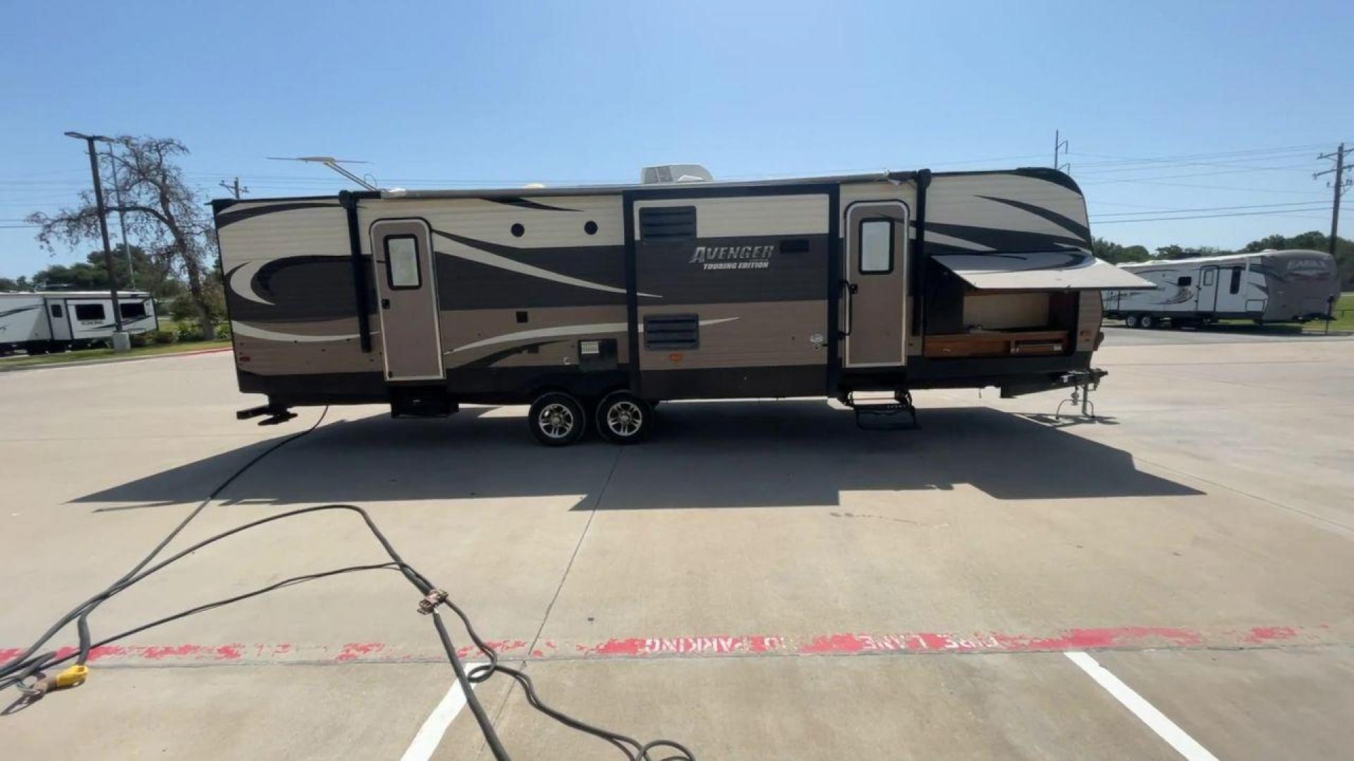 2016 TAN AVENGER 32FBI - (5ZT2AVXB6GB) , located at 4319 N Main Street, Cleburne, TX, 76033, (817) 221-0660, 32.435829, -97.384178 - Photo#2