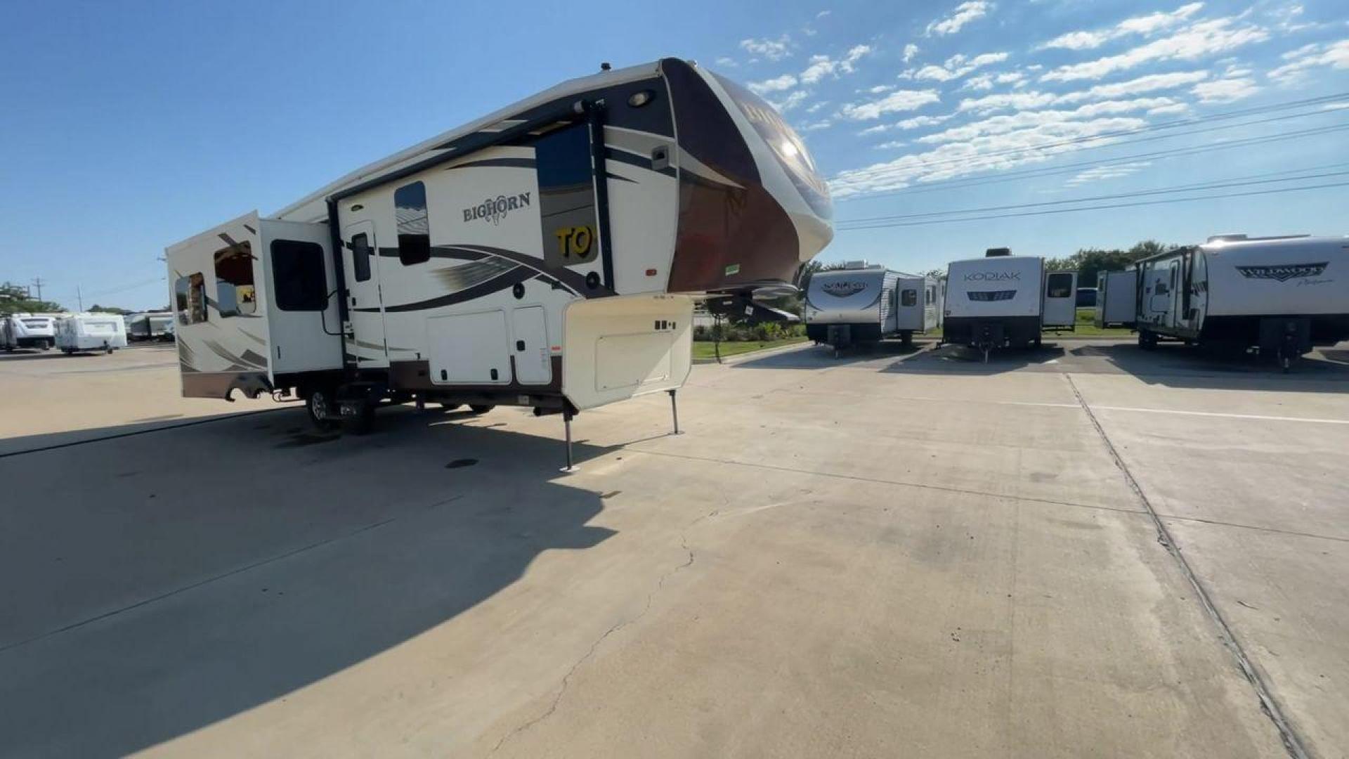 2016 BIG HORN 3010RE (5SFBG3427GE) , Length: 34.8 ft. | Dry Weight: 11,840 lbs. | Gross Weight: 15,500 lbs. | Slides: 3 transmission, located at 4319 N Main Street, Cleburne, TX, 76033, (817) 221-0660, 32.435829, -97.384178 - The 2016 Big Horn 3010RE fifth wheel is your gateway to luxury, comfort, and style on the road! This RV is designed to exceed your expectations with its carefully crafted floor plan and top-notch features. It is 8 ft. wide and almost 35 ft. long. Step inside the main living area that is ultimate - Photo#3