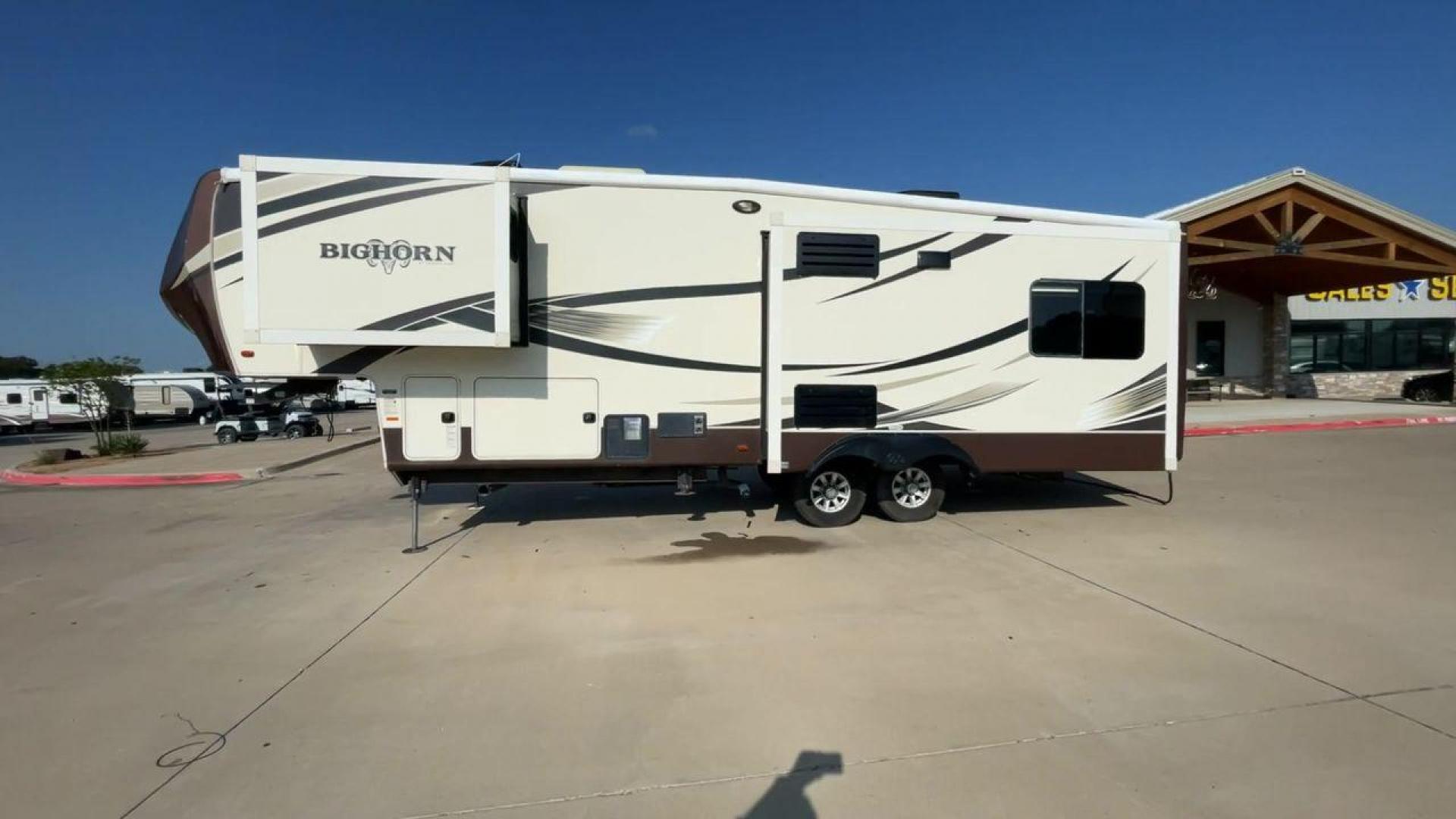 2016 BIG HORN 3010RE (5SFBG3427GE) , Length: 34.8 ft. | Dry Weight: 11,840 lbs. | Gross Weight: 15,500 lbs. | Slides: 3 transmission, located at 4319 N Main Street, Cleburne, TX, 76033, (817) 221-0660, 32.435829, -97.384178 - The 2016 Big Horn 3010RE fifth wheel is your gateway to luxury, comfort, and style on the road! This RV is designed to exceed your expectations with its carefully crafted floor plan and top-notch features. It is 8 ft. wide and almost 35 ft. long. Step inside the main living area that is ultimate - Photo#6