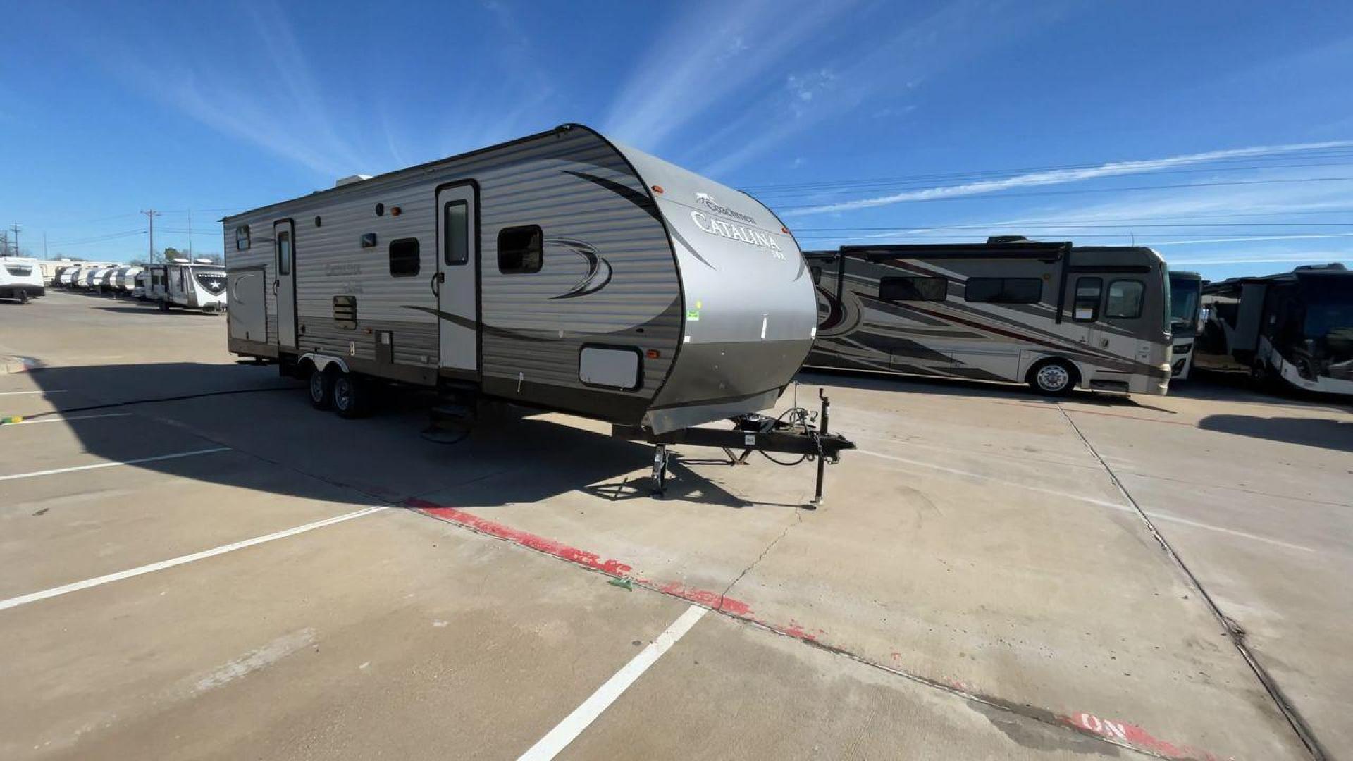 2016 GRAY CATALINA 321BHDSCK (5ZT2CAXBXGT) , Length: 35.83 ft. | Dry Weight: 7,690 lbs | Gross Weight: 9,500 lbs | Slides: 2 transmission, located at 4319 N Main Street, Cleburne, TX, 76033, (817) 221-0660, 32.435829, -97.384178 - This 2016 Catalina Travel Trailer boasts dimensions of just under 36 feet in length and 8 feet in width, with a GVWR of 9,500 lbs and a hitch weight of 790 lbs. Equipped with automatic heating and cooling capabilities rated at 30,000 and 13,500 BTUs, respectively, it ensures optimal temperature cont - Photo#3