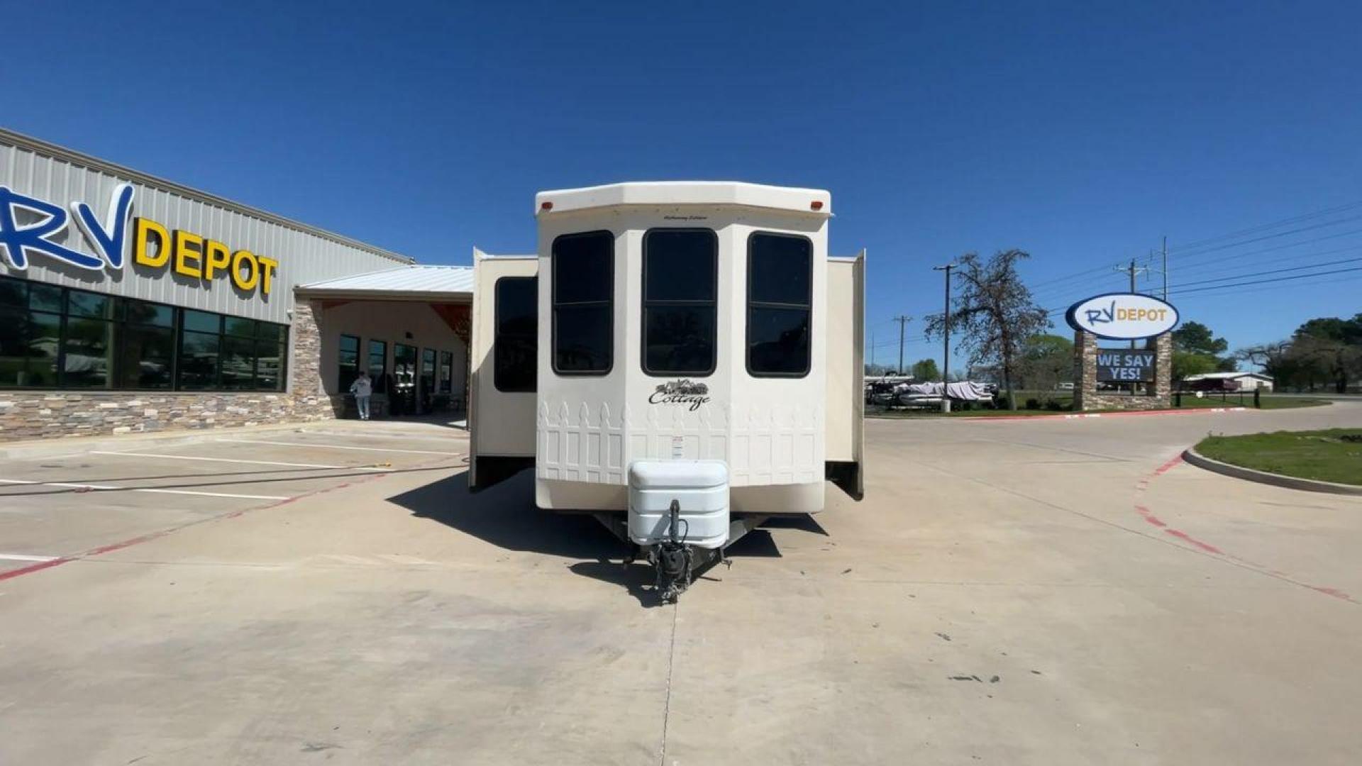 2016 TAN CEDAR CREEK COTTAGE 40CCK (4X4TCRS24GS) , Length: 40.33 ft. | Dry Weight: 11,245 lbs. | Gross Weight: 13,835 lbs. | Slides: 3 transmission, located at 4319 N Main Street, Cleburne, TX, 76033, (817) 221-0660, 32.435829, -97.384178 - Here are additional factors highlighting why owning this RV is a superb choice. (1) Stay connected and entertained with pre-wired cable and satellite connections. (2) It features high-gloss fiberglass exterior stands the test of time, while the interior boasts wood cabinetry and designer accents - Photo#4