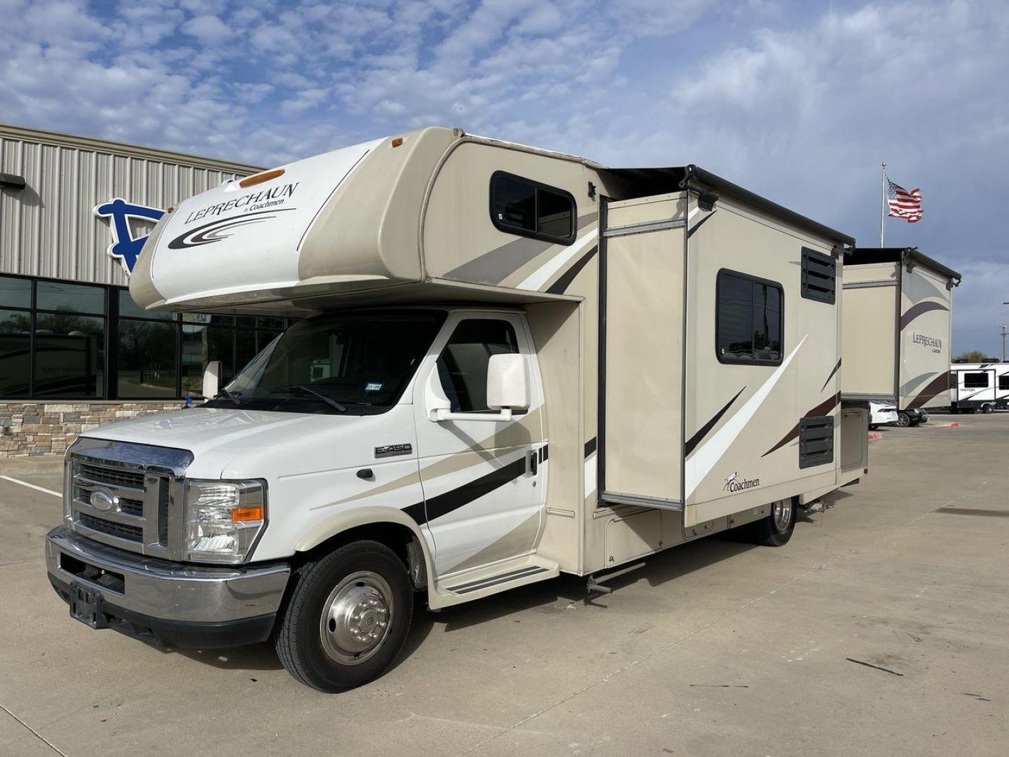 2016 COACHMEN LEPRECHAUN 260DS (1FDXE4FS5GD) , Length: 27.42 ft. | Dry Weight: 11,450 lbs. | Gross Weight: 14,500 lbs. | Slides: 2 transmission, located at 4319 N Main Street, Cleburne, TX, 76033, (817) 221-0660, 32.435829, -97.384178 - The 2016 Coachmen Leprechaun 260DS RV has an attractive exterior design, with a length of 27.42 feet. The vehicle's body is finished in beige with stylish brown and cream graphics running along the sides, with the "Leprechaun" branding prominently displayed up front. The front cab section has a clas - Photo#15