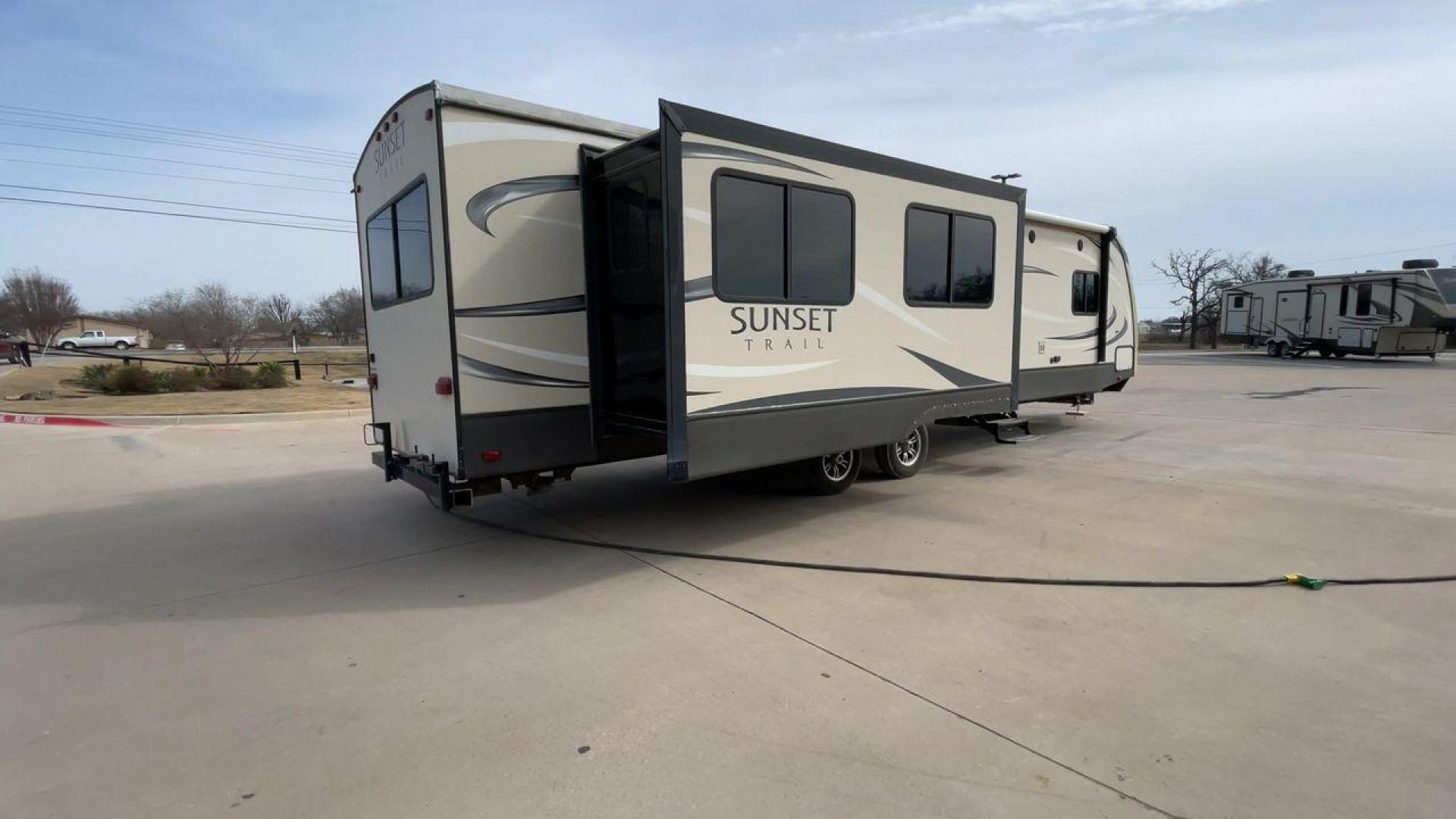 2016 BLACK CROSSROAD SUNSET TRAIL 32RE (4V0TC3226GE) , Length: 36.67 ft. | Dry Weight: 7,749 lbs. | Gross Weight: 9,728 lbs. | Slides: 3 transmission, located at 4319 N Main Street, Cleburne, TX, 76033, (817) 221-0660, 32.435829, -97.384178 - This 2016 Crossroad Sunset Trail 32RE measures in at 36.67 ft. It has a dry weight of 7,749 lbs. and a GVWR of 9,728 lbs. With 3 slides, this travel trailer is extremely spacious and comfortable! Inside, you will find a homey combined living and kitchen area with an entertainment center and booth-st - Photo#1