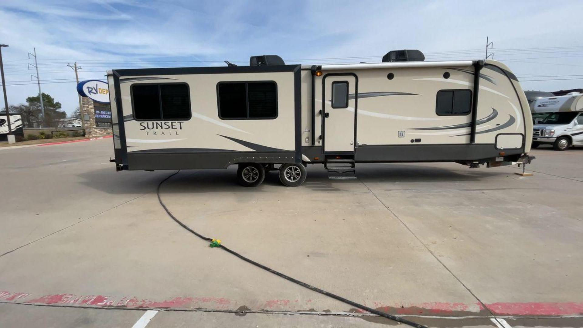 2016 BLACK CROSSROAD SUNSET TRAIL 32RE (4V0TC3226GE) , Length: 36.67 ft. | Dry Weight: 7,749 lbs. | Gross Weight: 9,728 lbs. | Slides: 3 transmission, located at 4319 N Main Street, Cleburne, TX, 76033, (817) 221-0660, 32.435829, -97.384178 - This 2016 Crossroad Sunset Trail 32RE measures in at 36.67 ft. It has a dry weight of 7,749 lbs. and a GVWR of 9,728 lbs. With 3 slides, this travel trailer is extremely spacious and comfortable! Inside, you will find a homey combined living and kitchen area with an entertainment center and booth-st - Photo#2