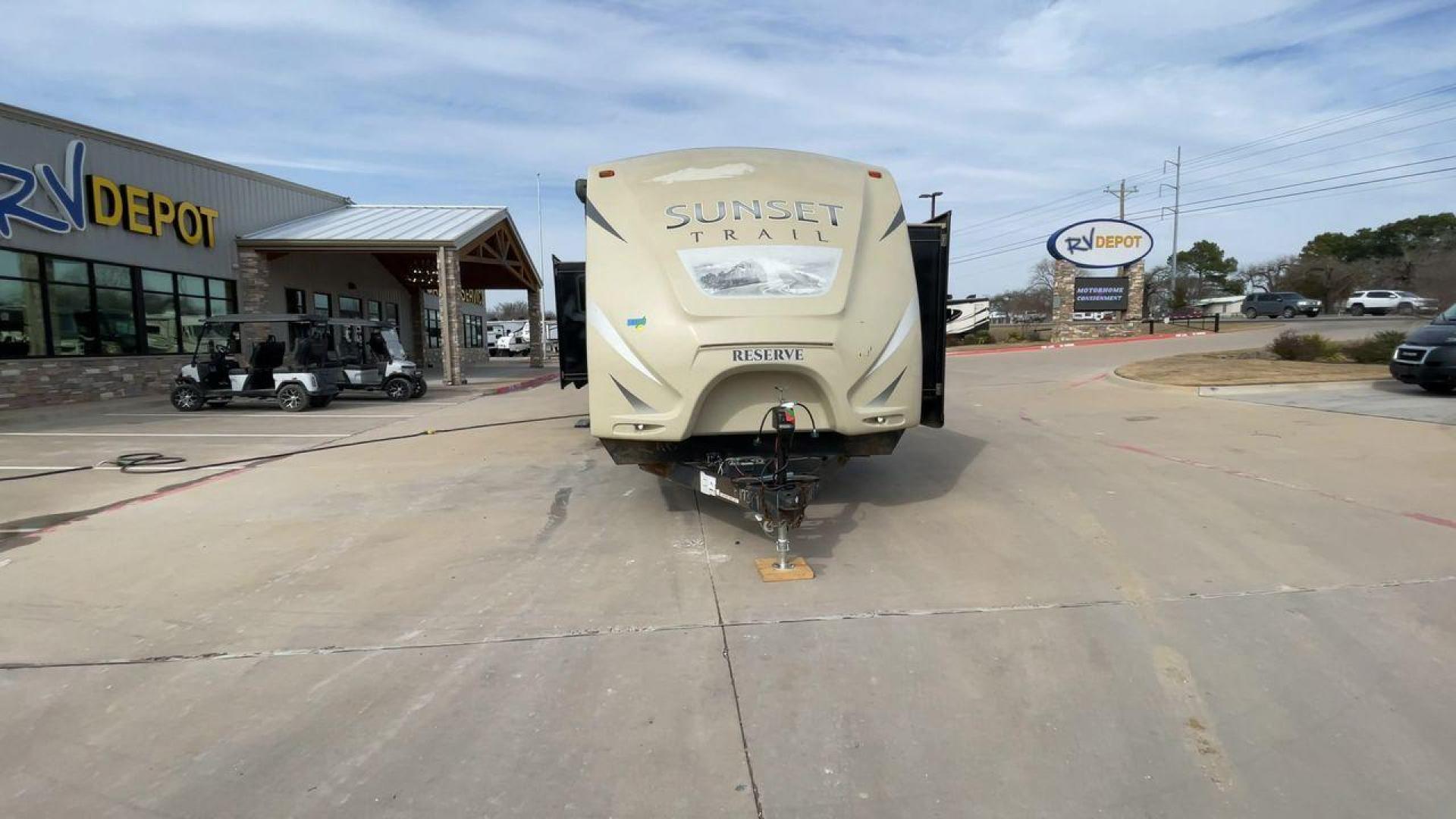 2016 BLACK CROSSROAD SUNSET TRAIL 32RE (4V0TC3226GE) , Length: 36.67 ft. | Dry Weight: 7,749 lbs. | Gross Weight: 9,728 lbs. | Slides: 3 transmission, located at 4319 N Main Street, Cleburne, TX, 76033, (817) 221-0660, 32.435829, -97.384178 - This 2016 Crossroad Sunset Trail 32RE measures in at 36.67 ft. It has a dry weight of 7,749 lbs. and a GVWR of 9,728 lbs. With 3 slides, this travel trailer is extremely spacious and comfortable! Inside, you will find a homey combined living and kitchen area with an entertainment center and booth-st - Photo#4