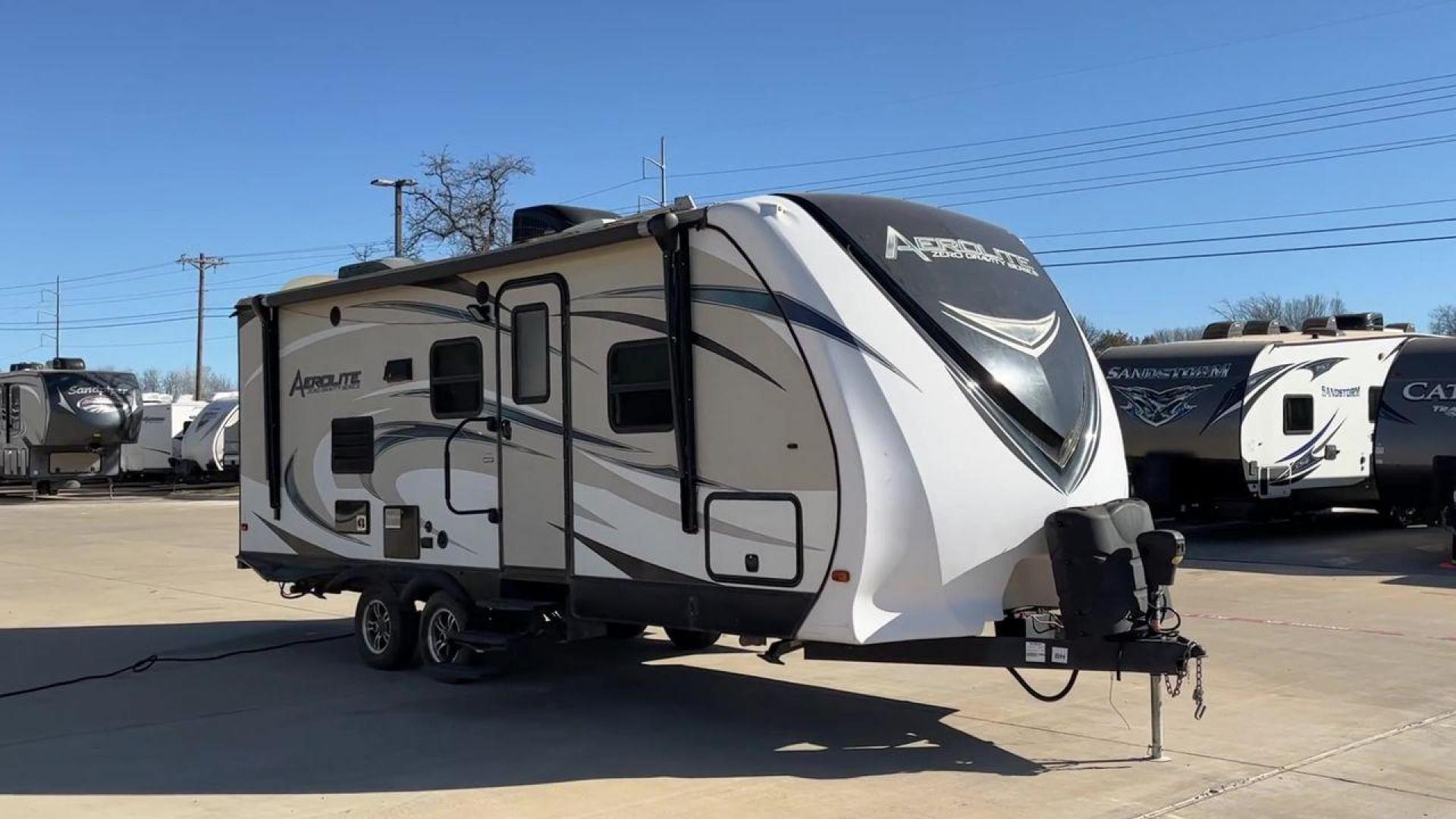 2016 DUTCHMEN AEROLITE 221BHSL (4YDT22121GP) , Length: 26.58 ft. | Dry Weight: 5,271 lbs. | Slides: 1 transmission, located at 4319 N Main Street, Cleburne, TX, 76033, (817) 221-0660, 32.435829, -97.384178 - Experience the 2016 Dutchmen Aerolite 221BHSL Travel Trailer, which offers the ideal balance of comfort and adaptability. This travel trailer provides a comfortable living area for your road trips and is ideal for both families and adventure seekers. This trailer measures 26.58 ft in length by 11.42 - Photo#3