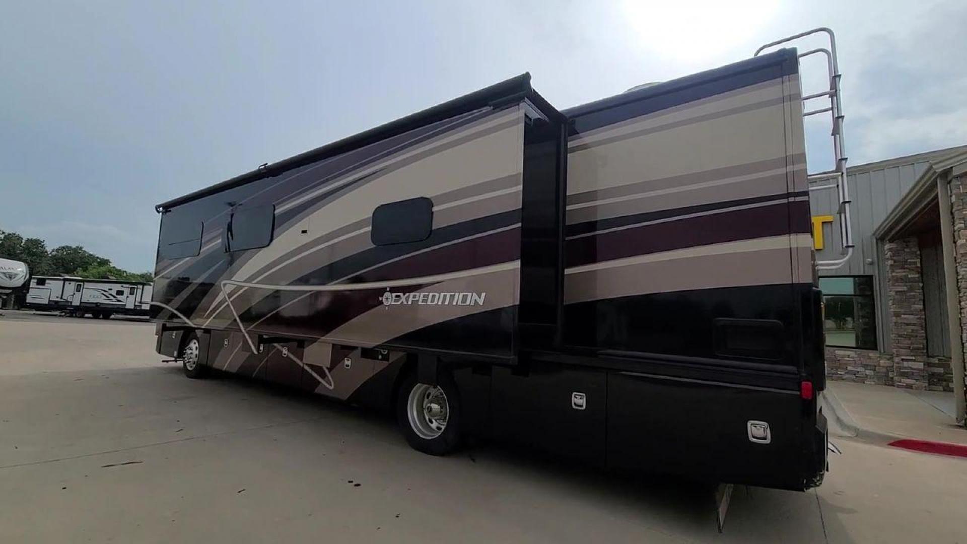 2016 BLACK DES FLEETWOOD EXPEDITION 38K (4UZACWDT2GC) , Length: 38.62 ft | Gross Weight: 32,400 lbs. | Slides: 3 transmission, located at 4319 N Main Street, Cleburne, TX, 76033, (817) 221-0660, 32.435829, -97.384178 - The 2016 Fleetwood Expedition 36K motorhome runs for about 50,505 miles. The dimensions are 38.62 ft in length, 8.5 ft in width, 12.83 ft in height, 7 ft interior height, and a wheelbase of 21 ft. It has a towing capacity of 10,000 lbs and a GVWR of 32,400 lbs. There are three total slideouts and on - Photo#1