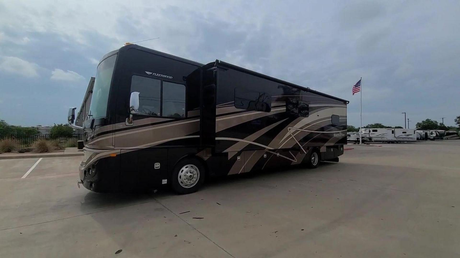 2016 BLACK DES FLEETWOOD EXPEDITION 38K (4UZACWDT2GC) , Length: 38.62 ft | Gross Weight: 32,400 lbs. | Slides: 3 transmission, located at 4319 N Main Street, Cleburne, TX, 76033, (817) 221-0660, 32.435829, -97.384178 - The 2016 Fleetwood Expedition 36K motorhome runs for about 50,505 miles. The dimensions are 38.62 ft in length, 8.5 ft in width, 12.83 ft in height, 7 ft interior height, and a wheelbase of 21 ft. It has a towing capacity of 10,000 lbs and a GVWR of 32,400 lbs. There are three total slideouts and on - Photo#3