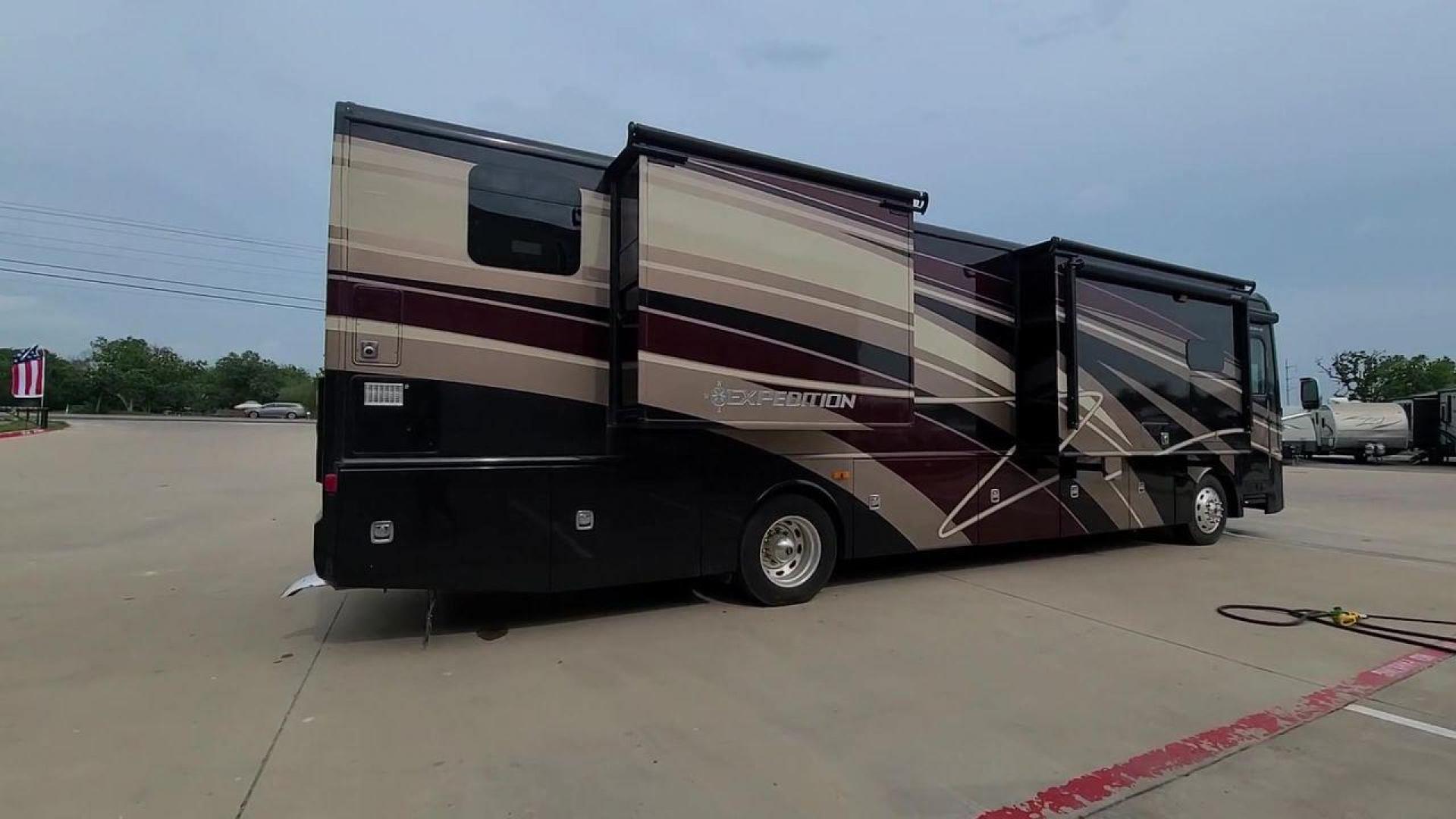 2016 BLACK DES FLEETWOOD EXPEDITION 38K (4UZACWDT2GC) , Length: 38.62 ft | Gross Weight: 32,400 lbs. | Slides: 3 transmission, located at 4319 N Main Street, Cleburne, TX, 76033, (817) 221-0660, 32.435829, -97.384178 - The 2016 Fleetwood Expedition 36K motorhome runs for about 50,505 miles. The dimensions are 38.62 ft in length, 8.5 ft in width, 12.83 ft in height, 7 ft interior height, and a wheelbase of 21 ft. It has a towing capacity of 10,000 lbs and a GVWR of 32,400 lbs. There are three total slideouts and on - Photo#7