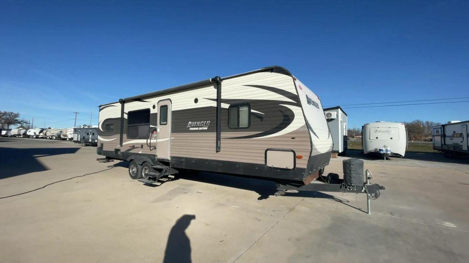 2016 FOREST RIVER AVENGER 28RKS - (5ZT2AVTBXGB) , located at 4319 N Main Street, Cleburne, TX, 76033, (817) 221-0660, 32.435829, -97.384178 - Photo#3