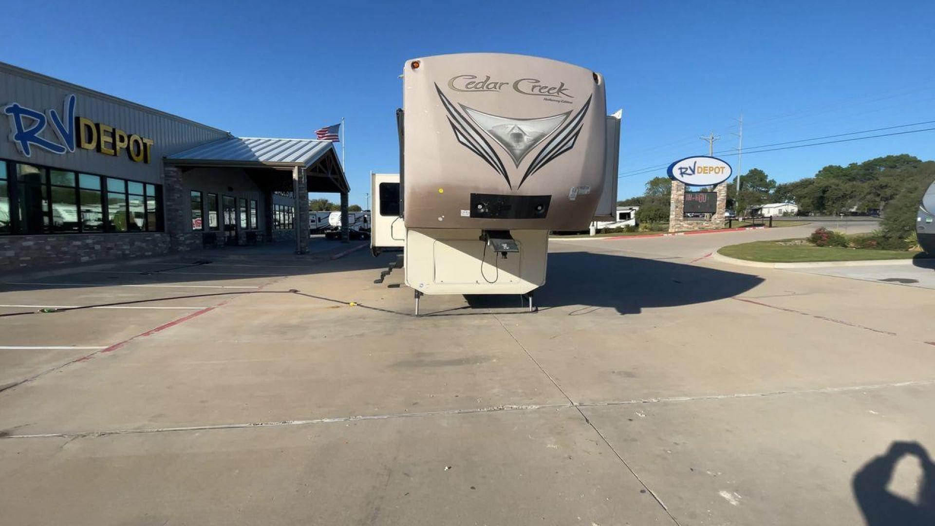 2016 FOREST RIVER CEDAR CREEK 36CKTS - (4X4FCRM24GS) , Length: 39.83 ft. | Dry Weight: 12,670 lbs. | Gross Weight: 16,407 lbs. | Slides: 3 transmission, located at 4319 N Main Street, Cleburne, TX, 76033, (817) 221-0660, 32.435829, -97.384178 - RV Depot in Cleburne, TX is offering a fantastic deal on a 2016 Forest River Cedar Creek 36KTS fifth wheel rear living vehicle. Priced at just $53,995, this luxurious RV is perfect for those looking to hit the open road and explore the local driving highlights around Cleburne, TX. Located in Clebur - Photo#4