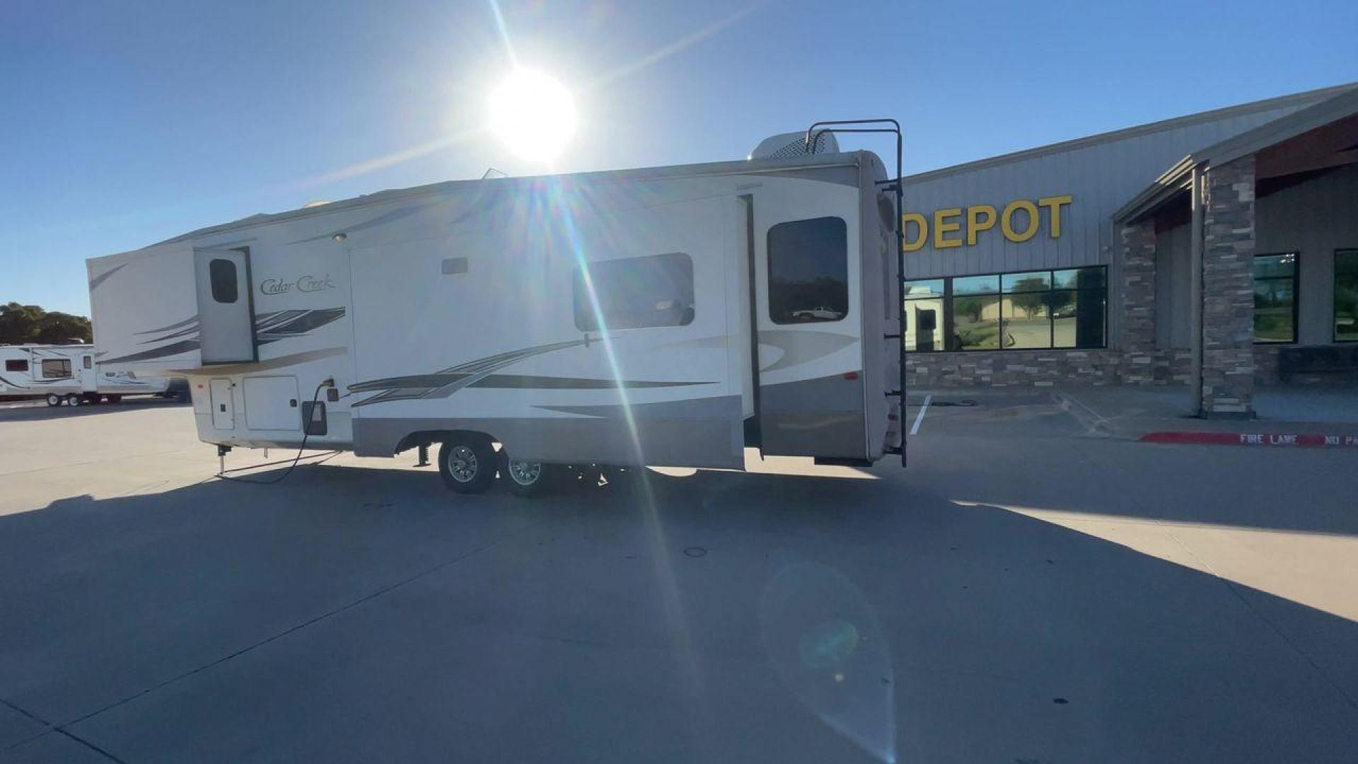 2016 FOREST RIVER CEDAR CREEK 36CKTS - (4X4FCRM24GS) , Length: 39.83 ft. | Dry Weight: 12,670 lbs. | Gross Weight: 16,407 lbs. | Slides: 3 transmission, located at 4319 N Main Street, Cleburne, TX, 76033, (817) 221-0660, 32.435829, -97.384178 - RV Depot in Cleburne, TX is offering a fantastic deal on a 2016 Forest River Cedar Creek 36KTS fifth wheel rear living vehicle. Priced at just $53,995, this luxurious RV is perfect for those looking to hit the open road and explore the local driving highlights around Cleburne, TX. Located in Clebur - Photo#7