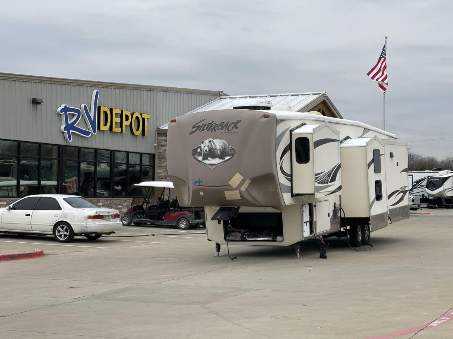 2016 BEIGE FOREST RIVER CEDAR CREEK SILVERBA - (4X4FCRN29GS) , Length: 42.17 ft. | Dry Weight: 12,620 lbs. | Gross Weight: 16,135 lbs. | Slides: 4 transmission, located at 4319 N Main Street, Cleburne, TX, 76033, (817) 221-0660, 32.435829, -97.384178 - This 2016 Forest River Fifth Wheel measures in at just over 42 feet long and 8 feet wide with a dry weight of 12,620 lbs. It has a GVWR of 16,135 lbs and a hitch weight of 2,135 lbs. It also comes with automatic heating and cooling rated at 40,000 and 15,000 BTUs respectively. The exterior of this u - Photo#0