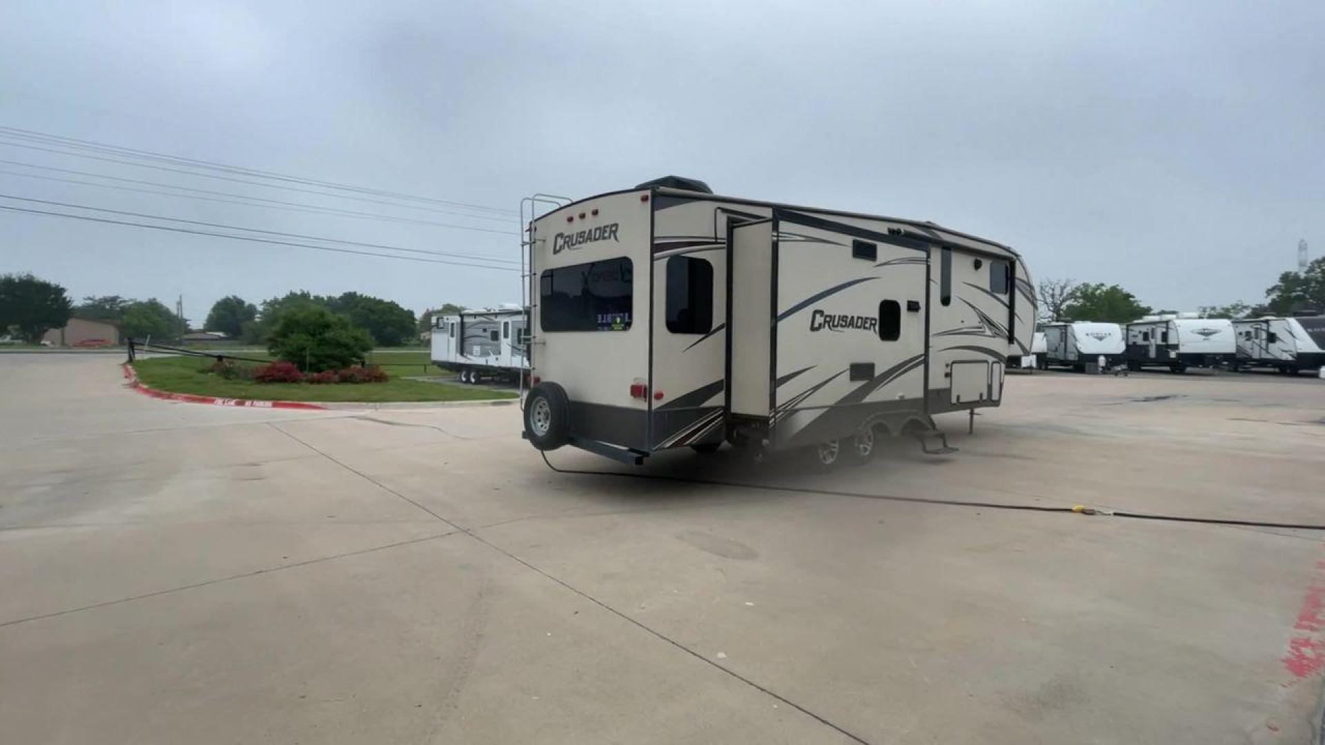 2016 TAN FOREST RIVER CRUSADER 315 (5ZT3CSXB8GG) , Length: 33.92 ft. | Dry Weight: 9,926 lbs. | Gross Weight: 12,353 lbs. | Slides: 3 transmission, located at 4319 N Main Street, Cleburne, TX, 76033, (817) 221-0660, 32.435829, -97.384178 - This 2016 Forest River Crusader 315 fifth wheel has dimensions of 33.92 ft in length, 8 ft in width, and 12.5 ft in height. It has a dry weight of 9,926 lbs, a payload capacity of 2,427 lbs. The GVWR is 12,353 lbs, and the hitch weight is 1,953 lbs. This fifth wheel has an aluminum body material and - Photo#1