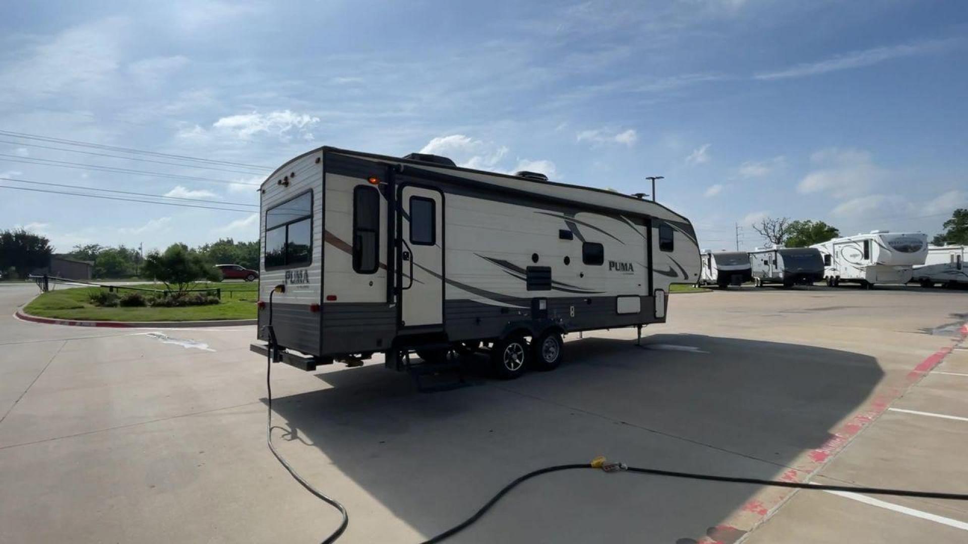 2016 FOREST RIVER PUMA 297RLSS (4X4FPUF29GP) , located at 4319 N Main Street, Cleburne, TX, 76033, (817) 221-0660, 32.435829, -97.384178 - Photo#1