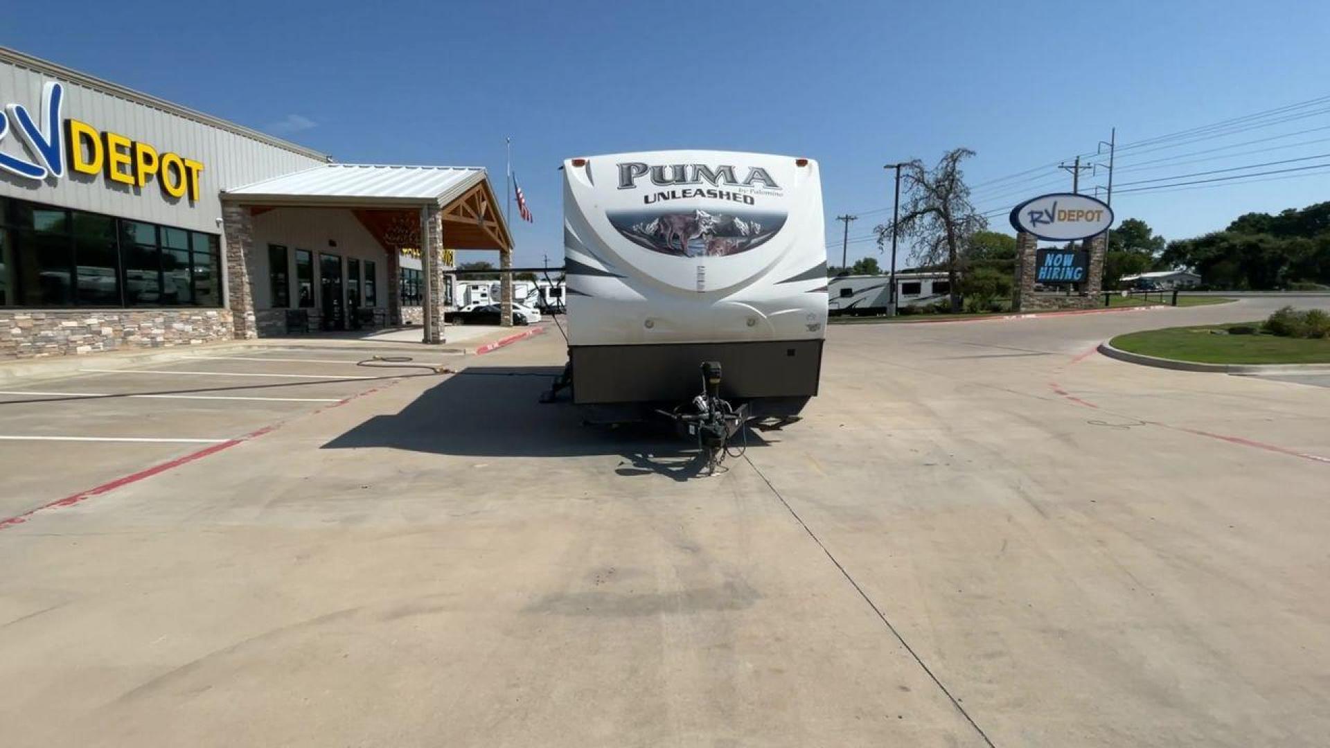 2016 FOREST RIVER PUMA UNLEASHED 25TFS (4X4TPTA27GP) , Length: 29.67 ft. | Dry Weight: 6,991 lbs. | Gross Weight: 9,939 lbs. | Slides: 0 transmission, located at 4319 N Main Street, Cleburne, TX, 76033, (817) 221-0660, 32.435829, -97.384178 - This 2016 Forest River Puma Unleashed 25TFS measures just under 30 feet long. It has a dry weight of 6,991 lbs. and a GVWR of 9,939 lbs. It comes equipped with automatic heating and cooling rated at 30,000 and 13,500 BTUs respectively. It is also designed with a 14-foot power awning. This toy hau - Photo#4