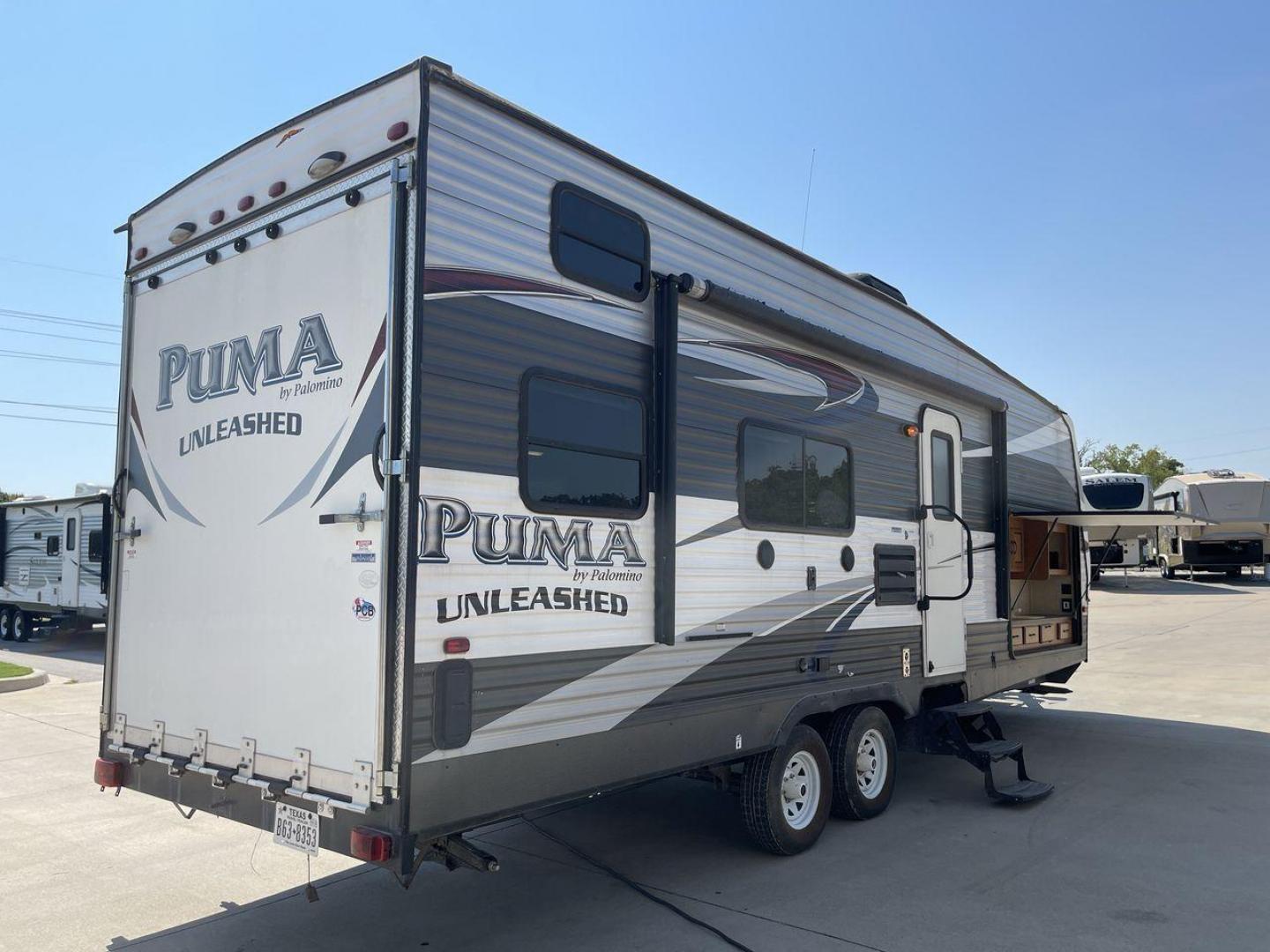 2016 FOREST RIVER PUMA UNLEASHED 25TFS (4X4TPTA27GP) , Length: 29.67 ft. | Dry Weight: 6,991 lbs. | Gross Weight: 9,939 lbs. | Slides: 0 transmission, located at 4319 N Main Street, Cleburne, TX, 76033, (817) 221-0660, 32.435829, -97.384178 - This 2016 Forest River Puma Unleashed 25TFS measures just under 30 feet long. It has a dry weight of 6,991 lbs. and a GVWR of 9,939 lbs. It comes equipped with automatic heating and cooling rated at 30,000 and 13,500 BTUs respectively. It is also designed with a 14-foot power awning. This toy hau - Photo#25