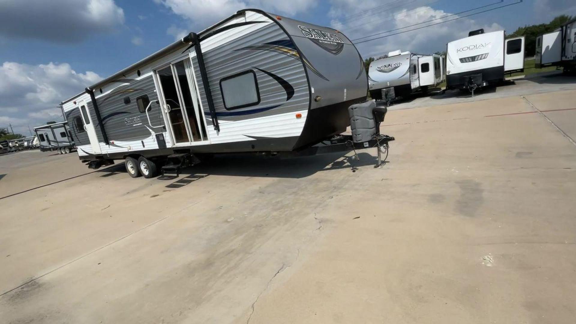 2016 FOREST RIVER SALEM 36BHBS (4X4TSMM26G8) , Length: 36.58 ft. | Dry Weight: 7,892 lbs. | Slides: 2 transmission, located at 4319 N Main Street, Cleburne, TX, 76033, (817) 221-0660, 32.435829, -97.384178 - The 2016 Forest River Salem 36BHBS is a well-designed, spacious travel trailer perfect for family getaways or extended road trips. With a length of 36.58 feet and a dry weight of 7,892 lbs., this RV offers a comfortable living space while remaining manageable to tow. The dual slide-outs provide adde - Photo#3