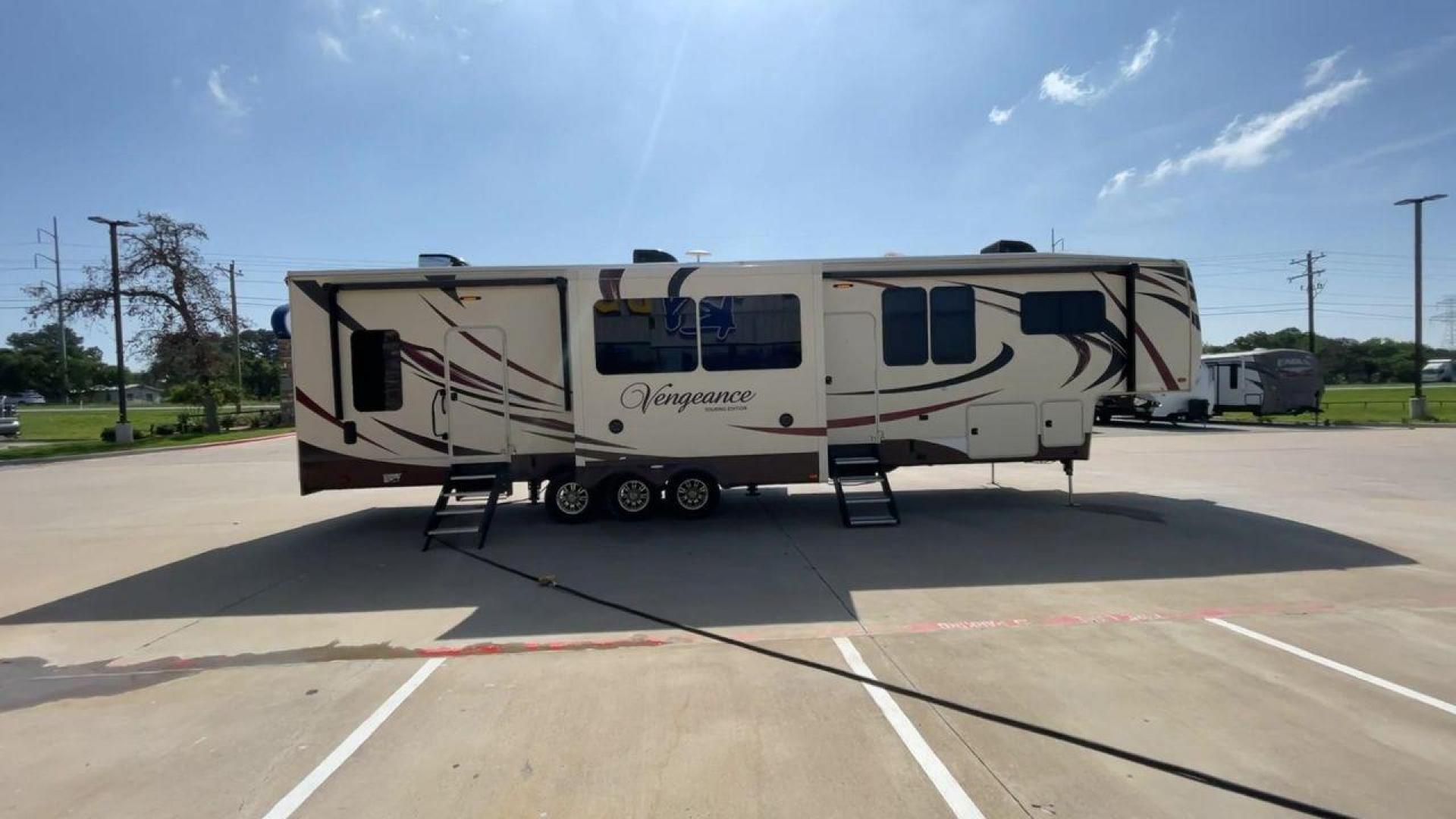 2016 FOREST RIVER VENGEANCE 38L12 (4X4FVGP36GR) , Length: 42.83 ft | Dry Weight: 14,814 lbs | Gross Weight: 18,000 lbs | Slides: 3 transmission, located at 4319 N Main Street, Cleburne, TX, 76033, (817) 221-0660, 32.435829, -97.384178 - The 2016 Forest River Vengeance 38L12 is a luxury fifth-wheel toy hauler that provides a spacious and comfortable living area for all of your activities. With a length of roughly 42.83 feet and a dry weight of 14,814 pounds, this RV offers enough space and durability to meet your demands. With an al - Photo#2