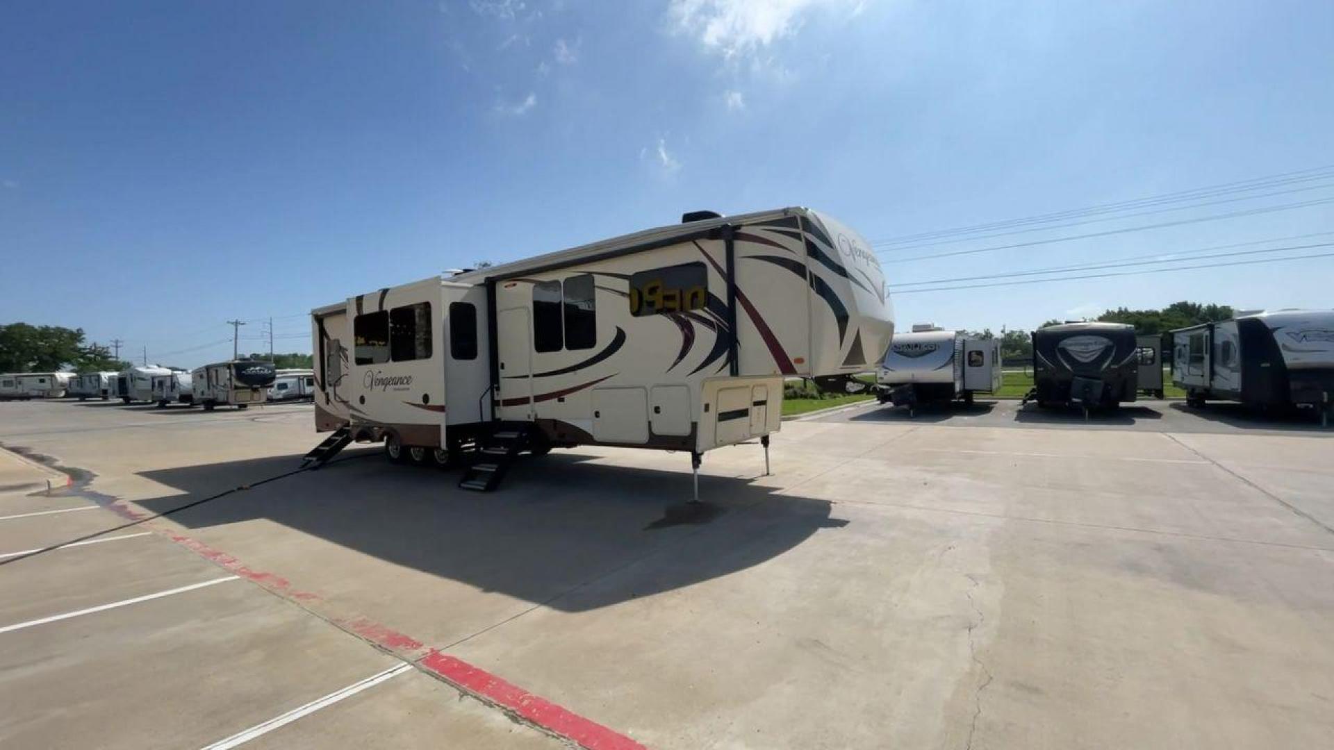 2016 FOREST RIVER VENGEANCE 38L12 (4X4FVGP36GR) , Length: 42.83 ft | Dry Weight: 14,814 lbs | Gross Weight: 18,000 lbs | Slides: 3 transmission, located at 4319 N Main Street, Cleburne, TX, 76033, (817) 221-0660, 32.435829, -97.384178 - The 2016 Forest River Vengeance 38L12 is a luxury fifth-wheel toy hauler that provides a spacious and comfortable living area for all of your activities. With a length of roughly 42.83 feet and a dry weight of 14,814 pounds, this RV offers enough space and durability to meet your demands. With an al - Photo#3