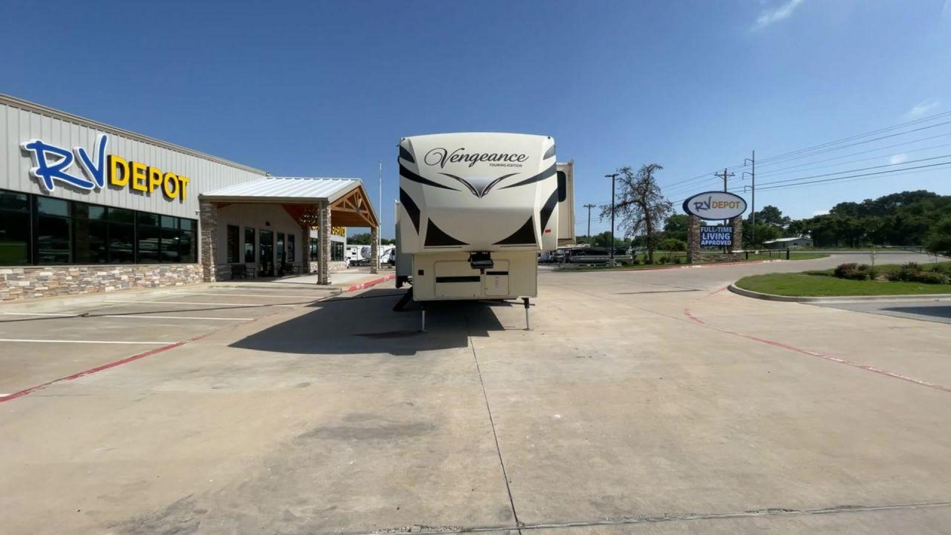 2016 FOREST RIVER VENGEANCE 38L12 (4X4FVGP36GR) , Length: 42.83 ft | Dry Weight: 14,814 lbs | Gross Weight: 18,000 lbs | Slides: 3 transmission, located at 4319 N Main Street, Cleburne, TX, 76033, (817) 221-0660, 32.435829, -97.384178 - The 2016 Forest River Vengeance 38L12 is a luxury fifth-wheel toy hauler that provides a spacious and comfortable living area for all of your activities. With a length of roughly 42.83 feet and a dry weight of 14,814 pounds, this RV offers enough space and durability to meet your demands. With an al - Photo#4