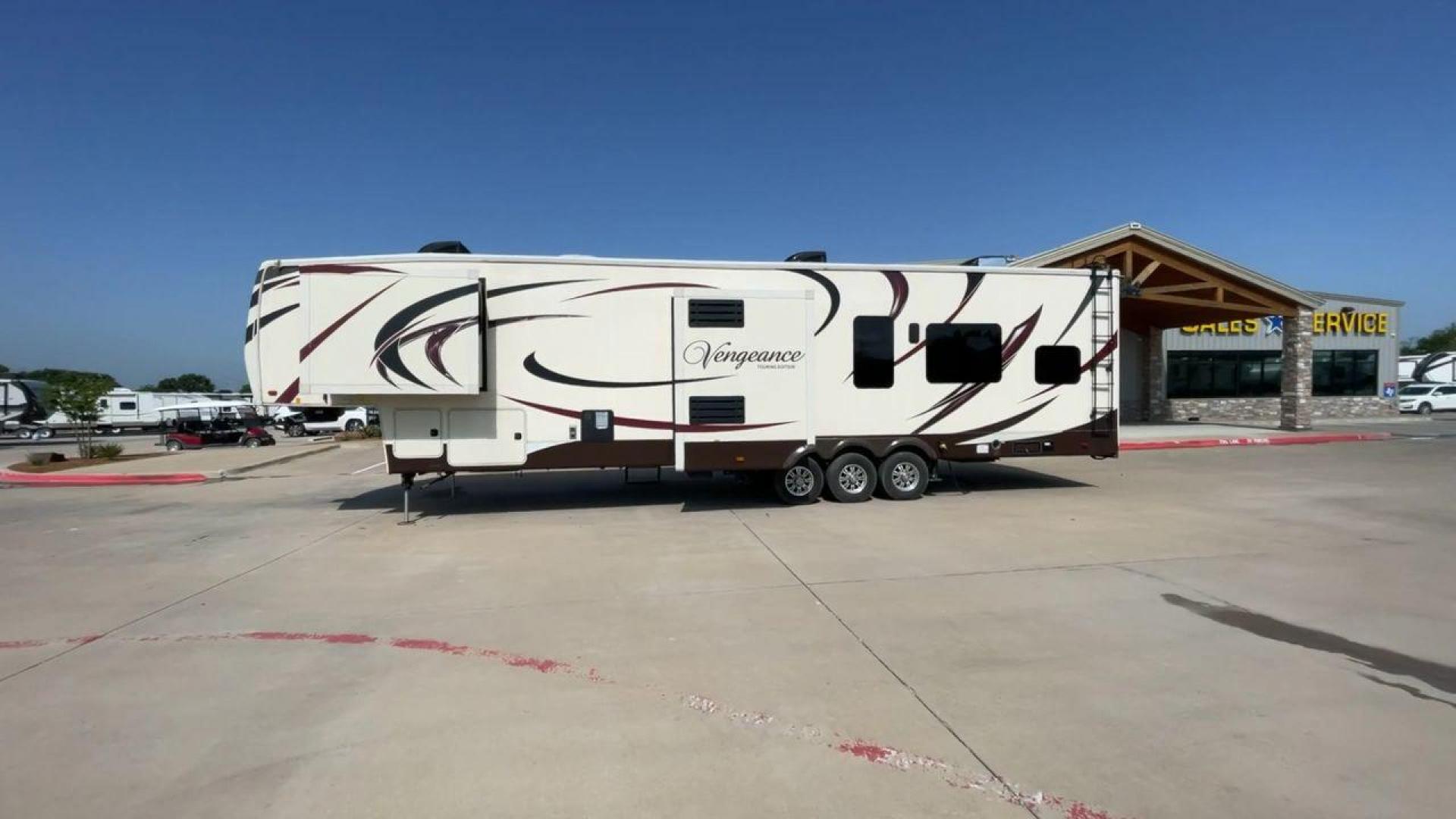 2016 FOREST RIVER VENGEANCE 38L12 (4X4FVGP36GR) , Length: 42.83 ft | Dry Weight: 14,814 lbs | Gross Weight: 18,000 lbs | Slides: 3 transmission, located at 4319 N Main Street, Cleburne, TX, 76033, (817) 221-0660, 32.435829, -97.384178 - The 2016 Forest River Vengeance 38L12 is a luxury fifth-wheel toy hauler that provides a spacious and comfortable living area for all of your activities. With a length of roughly 42.83 feet and a dry weight of 14,814 pounds, this RV offers enough space and durability to meet your demands. With an al - Photo#6