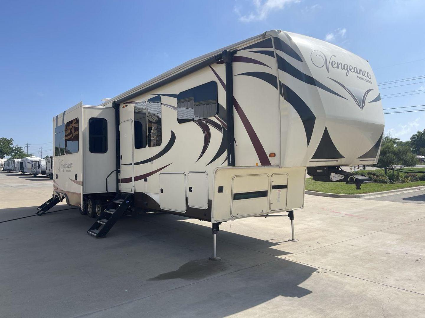 2016 FOREST RIVER VENGEANCE 38L12 (4X4FVGP36GR) , Length: 42.83 ft | Dry Weight: 14,814 lbs | Gross Weight: 18,000 lbs | Slides: 3 transmission, located at 4319 N Main Street, Cleburne, TX, 76033, (817) 221-0660, 32.435829, -97.384178 - The 2016 Forest River Vengeance 38L12 is a luxury fifth-wheel toy hauler that provides a spacious and comfortable living area for all of your activities. With a length of roughly 42.83 feet and a dry weight of 14,814 pounds, this RV offers enough space and durability to meet your demands. With an al - Photo#27