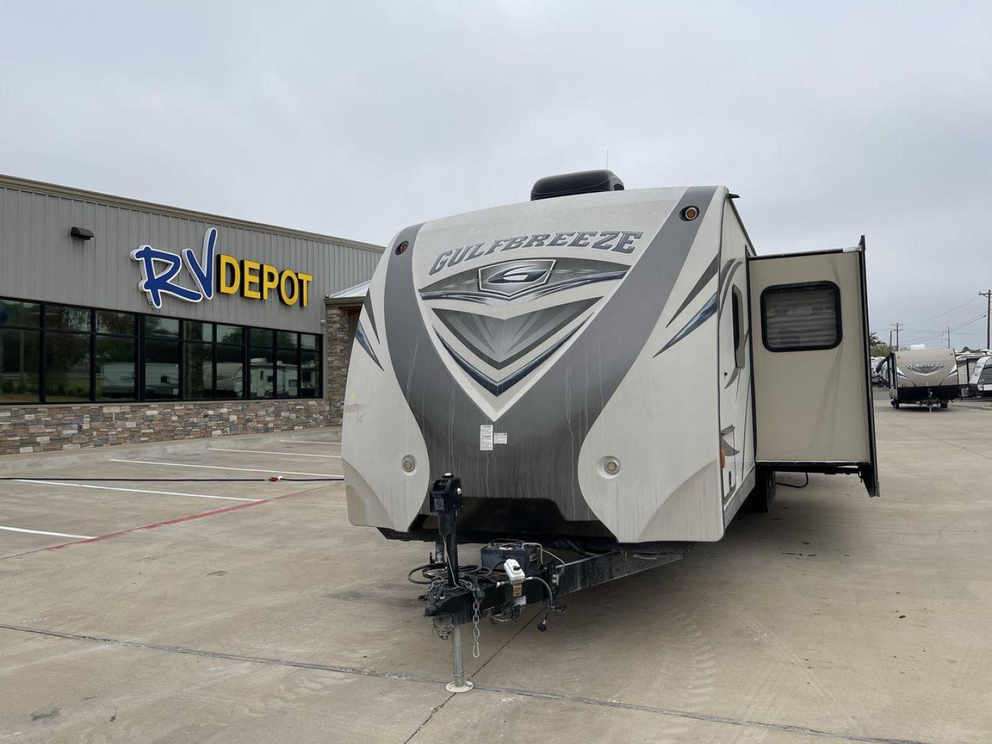 2016 TAN GULF BREEZE 30DBS - (1NL1XTP26G1) , Length: 35.33 ft. | Dry Weight: 6,640 lbs. | Slides: 2 transmission, located at 4319 N Main Street, Cleburne, TX, 76033, (817) 221-0660, 32.435829, -97.384178 - Explore more reasons that emphasize the benefits of having this RV as your own. (1) This model boasts upgraded décor with high-quality finishes, plush furniture, and stylish accents (2) The bedroom features a walk-around queen-size bed with ample storage and a private entrance to the bathroom - Photo#0