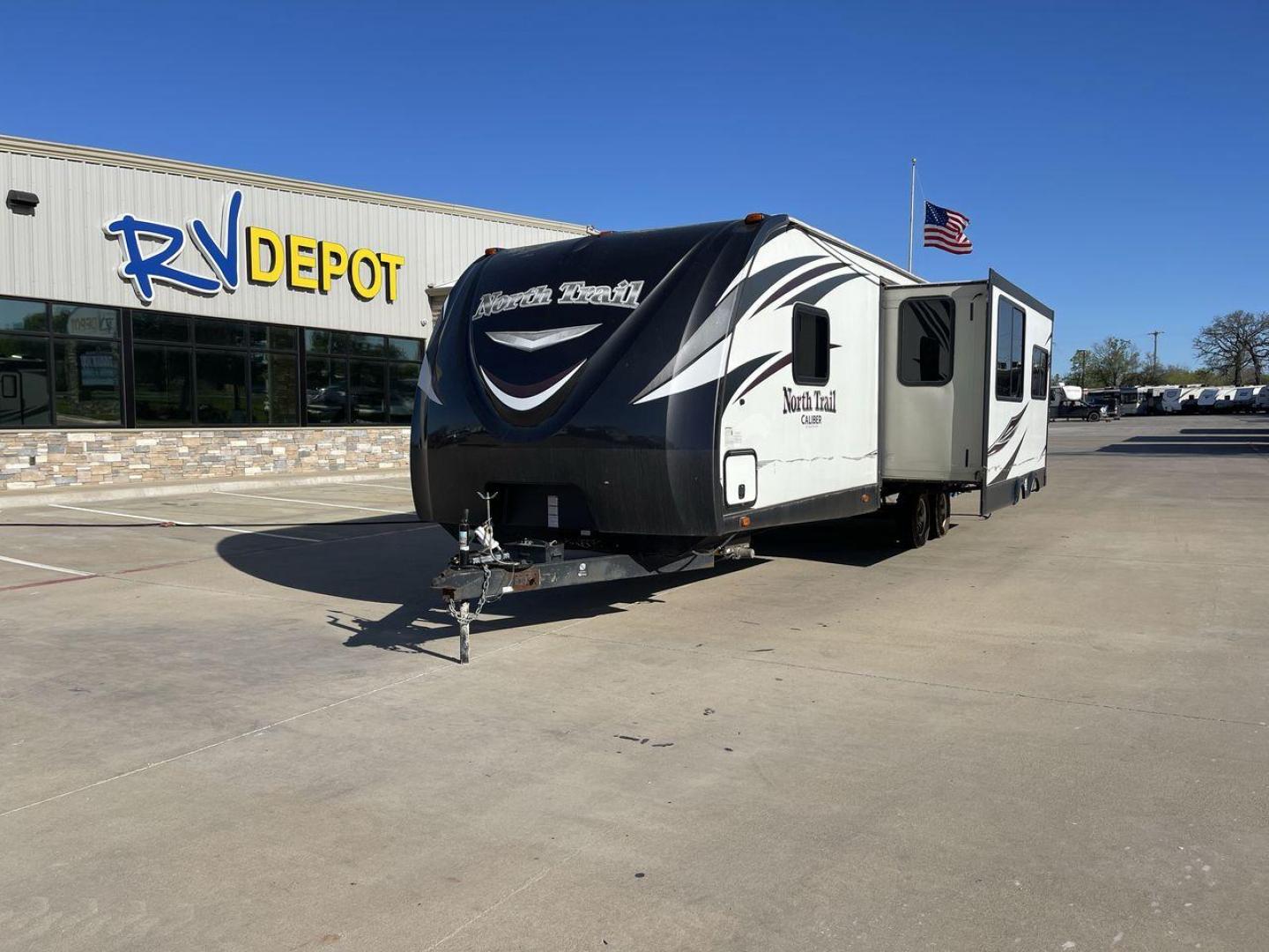 2016 WHITE HEARTLAND NORTH TRAIL 31BHDD - (5SFNB3529GE) , Length: 35.92 ft. | Dry Weight: 6,399 lbs. | Gross Weight: 8,600 lbs. | Slides: 1 transmission, located at 4319 N Main Street, Cleburne, TX, 76033, (817) 221-0660, 32.435829, -97.384178 - This 2016 Heartland North Trail NT KING 31BHDD travel trailer measures just under 36' in length. It is a dual axle, steel wheel setup with a dry weight of 6,399 lbs and has a carrying capacity of 2,165 lbs. This travel trailer has one slide. The front of the trailer holds the bedroom. It has a q - Photo#0