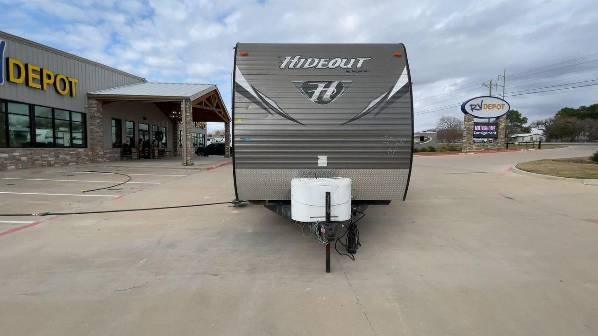 2016 WHITE HIDEOUT 300LHS - (4YDT30027G7) , Length: 35 ft | Dry Weight: 8,055 lbs | Gross Weight: 9,840 lbs. | Slides: 2 transmission, located at 4319 N Main Street, Cleburne, TX, 76033, (817) 221-0660, 32.435829, -97.384178 - The 2016 Keystone Hideout 300LHS is a well-designed travel trailer that combines comfort, functionality, and family-friendly features. Its thoughtful layout ensures a relaxing camping experience for families or groups seeking both style and practicality. The dimensions of this unit are 35 ft in leng - Photo#4