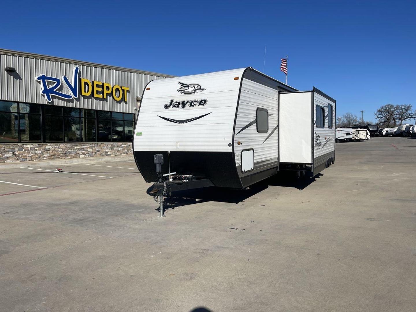 2016 WHITE JAYFLIGHT 287BHSW - (1UJBJ0BR5G1) , located at 4319 N Main Street, Cleburne, TX, 76033, (817) 221-0660, 32.435829, -97.384178 - Discover extra features that contribute to making this RV an ideal investment. (1) Easily access dry goods and kitchen essentials from both inside and outside the trailer through the convenient pass-through pantry. (2) Its dinette with booth seating provides ample space for meals, game nights, a - Photo#0