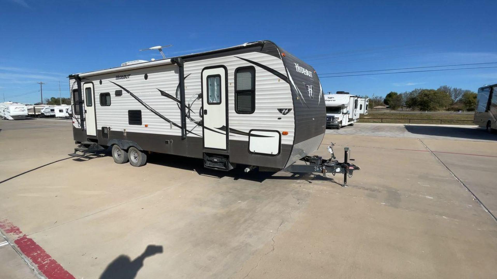 2016 KEYSTONE HIDEOUT (4YDT26R2XG7) , Length: 29.92 ft | Dry Weight: 6,334 lbs | Gross Weight: 7,835 lbs | Slides: 1 transmission, located at 4319 N Main Street, Cleburne, TX, 76033, (817) 221-0660, 32.435829, -97.384178 - The Hideout 26RLS by 26RLS travel trailer is a small, half-ton towable, inexpensive camper. It is 29.92 ft in length, 8 ft in width, and 11 ft in height. The dry weight is 6,334 lbs with a payload capacity of 1,501 lbs. The trailer has a GVWR of 7,835 lbs and a hitch weight of 835 lbs. It features l - Photo#3