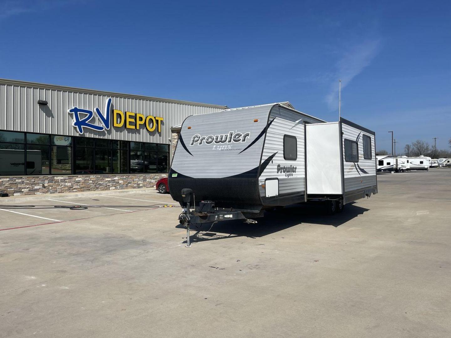 2016 KEYSTONE PROWLER 30LX (5SFPB3324GE) , Length: 33.92 ft. | Dry Weight: 6,720 lbs. | Gross Weight: 9,000 lbs. | Slides: 1 transmission, located at 4319 N Main Street, Cleburne, TX, 76033, (817) 221-0660, 32.435829, -97.384178 - The 2016 Keystone Prowler 30LX is a travel trailer designed to make our camping experiences extraordinary. With a dry weight of 6,720 lbs. and a gross weight of 9,000 lbs., this Heartland Prowler 30LX is lightweight yet sturdy. It is equipped with a single slide, which adds extra living space when e - Photo#0