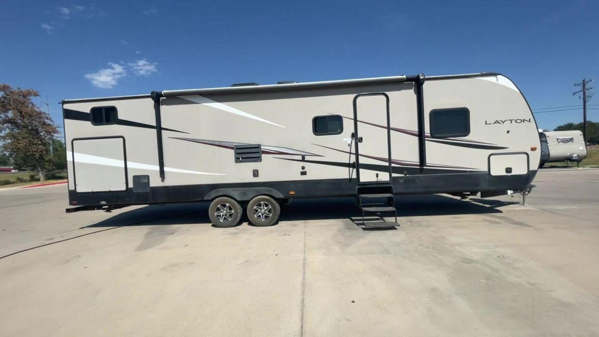 2016 TAN LAYTON 305BH - (5ZWTYTS21G4) , Length: 36.5 ft. | Dry Weight: 6,885 lbs. | Gross Weight: 11,200 lbs. | Slides: 2 transmission, located at 4319 N Main Street, Cleburne, TX, 76033, (817) 221-0660, 32.435829, -97.384178 - Go on your next trip with the 2016 Layton 305BH, a travel trailer that is roomy and well-equipped for comfort and ease of use. This RV provides ample space for the entire family to enjoy, measuring 36.5 feet in length and weighing 6,885 pounds when dry and 11,200 pounds when fully loaded. With two s - Photo#2