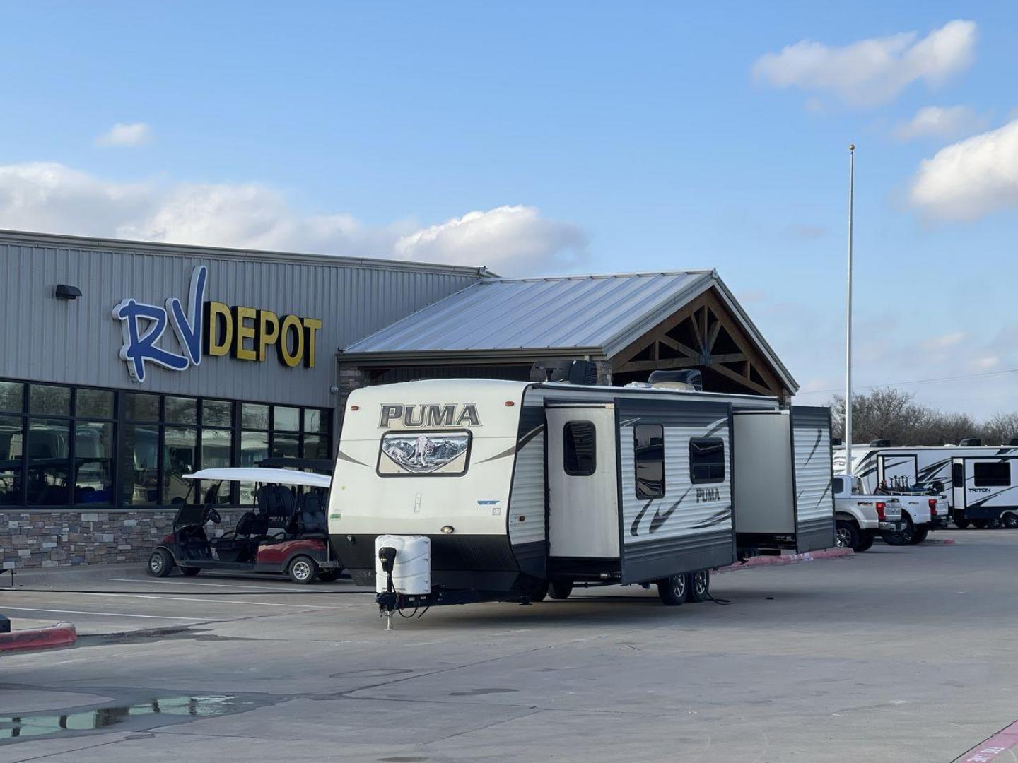 2016 TAN PALOMINO PUMA 30FKSS (4X4TPUF20GP) , Length: 34.75 ft. | Dry Weight: 7,992 lbs. | Gross Weight: 9,950 lbs. | Slides: 2 transmission, located at 4319 N Main Street, Cleburne, TX, 76033, (817) 221-0660, 32.435829, -97.384178 - Take advantage of the 2016 Palomino Puma 30FKSS Travel Trailer and embrace the spirit of adventure. With its stylish, functional, and comfortable design, this travel trailer provides a cozy living area for your road trips. This unit has dimensions of 34.75 ft in length, 8 ft in width, and 11.08 ft i - Photo#0