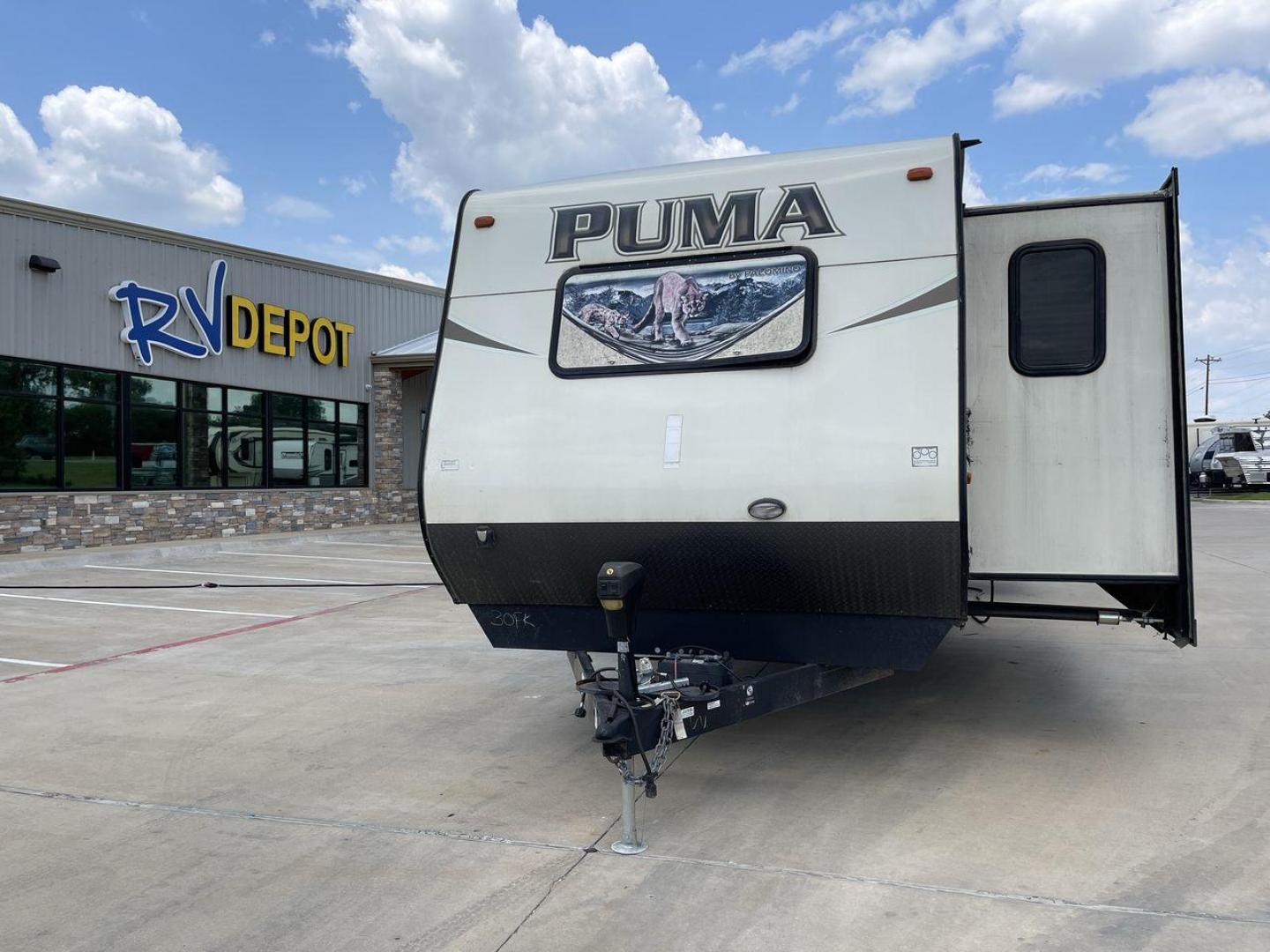 2016 TAN PALOMINO PUMA 30FKSS (4X4TPUF20GP) , Length: 34.75 ft. | Dry Weight: 7,992 lbs. | Gross Weight: 9,950 lbs. | Slides: 2 transmission, located at 4319 N Main Street, Cleburne, TX, 76033, (817) 221-0660, 32.435829, -97.384178 - Take advantage of the 2016 Palomino Puma 30FKSS Travel Trailer and embrace the spirit of adventure. With its stylish, functional, and comfortable design, this travel trailer provides a cozy living area for your road trips. This unit has dimensions of 34.75 ft in length, 8 ft in width, and 11.08 f - Photo#0